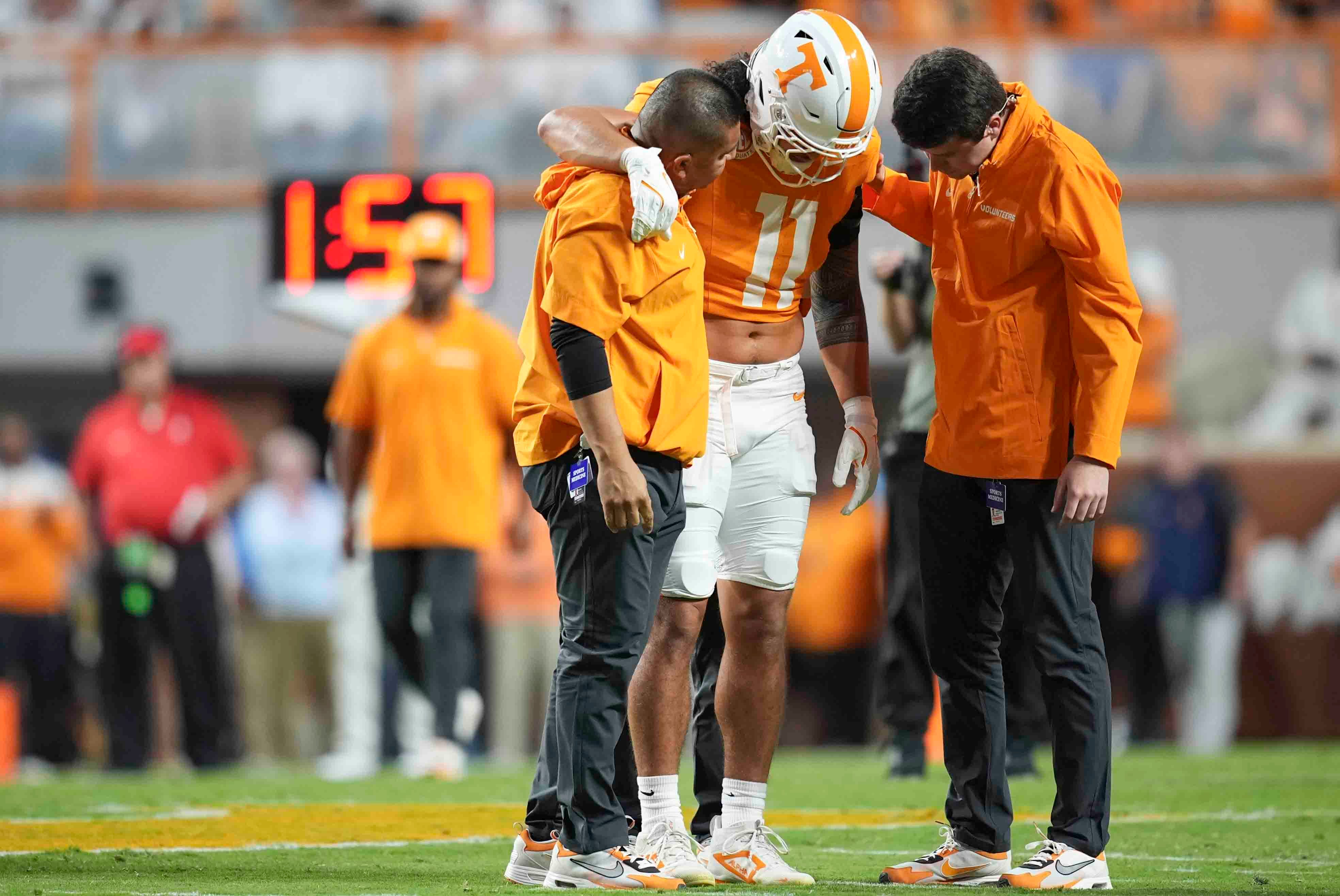 Tennessee linebacker Keenan Pili (11) walks off the field during a game between Florida and Tennessee in Neyland Stadium, in Knoxville, Tenn., Saturday, Oct. 12, 2024.