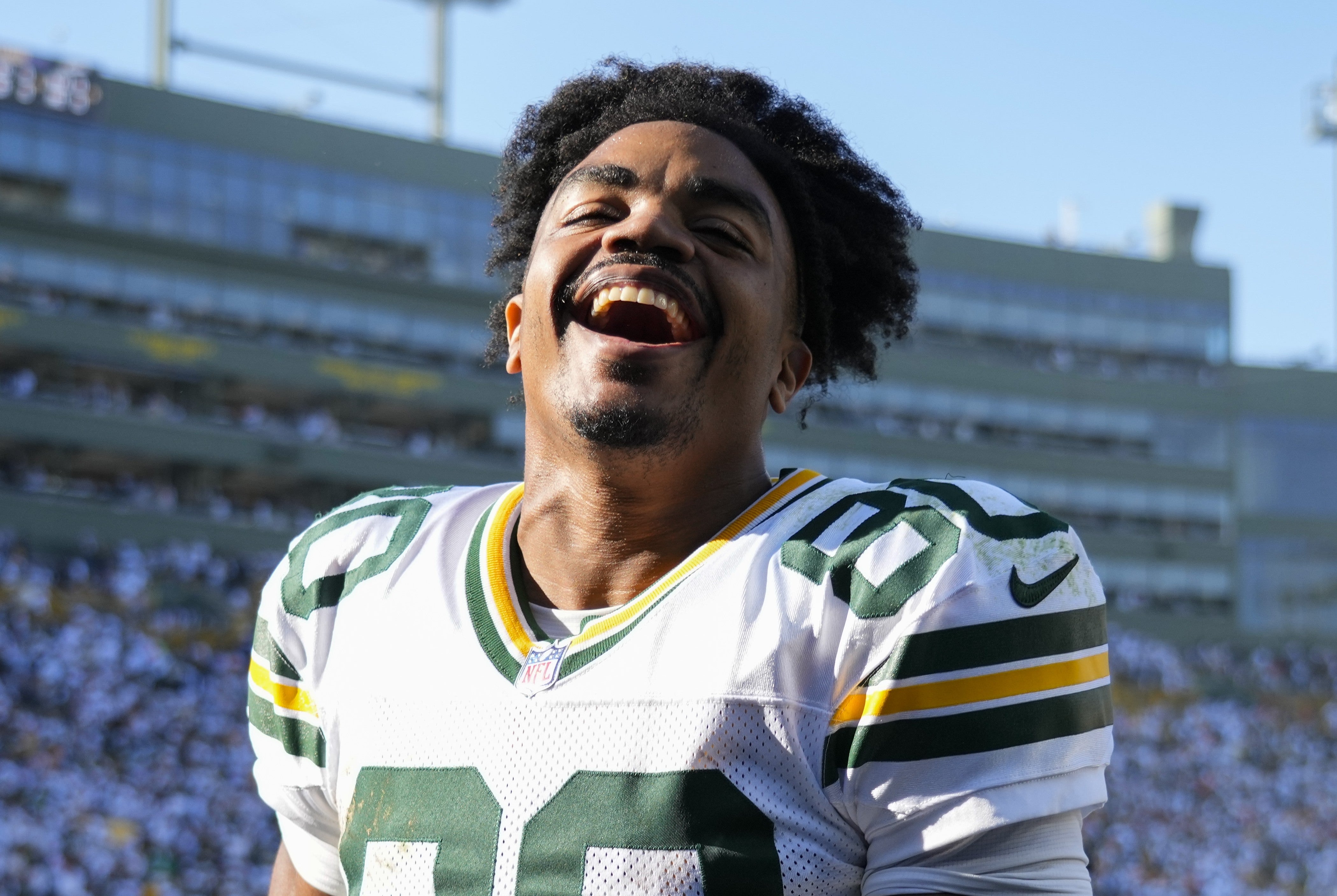 Oct 20, 2024; Green Bay, Wisconsin, USA; Green Bay Packers wide receiver Bo Melton (80) celebrates as he runs off the field following the game against the Houston Texans at Lambeau Field.