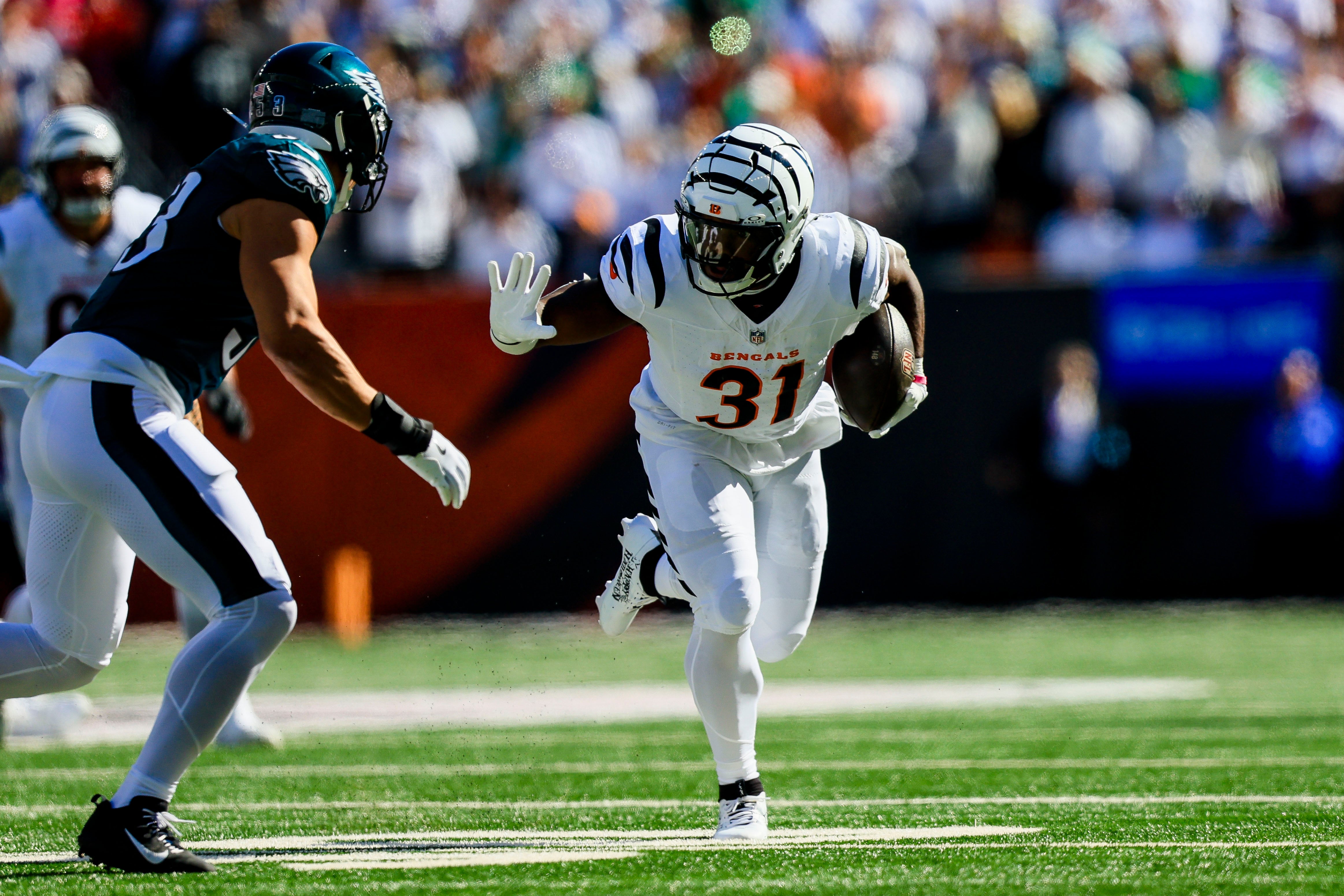 Oct 27, 2024; Cincinnati, Ohio, USA; Cincinnati Bengals running back Zack Moss (31) runs with the ball against the Philadelphia Eagles in the first half at Paycor Stadium.