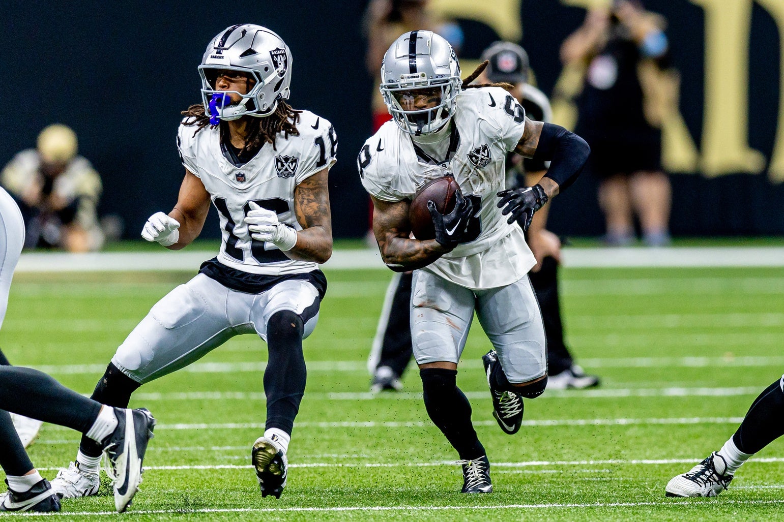 Dec 29, 2024; New Orleans, Louisiana, USA; Las Vegas Raiders running back Ameer Abdullah (8) rushes against the New Orleans Saints during the second half at Caesars Superdome.
