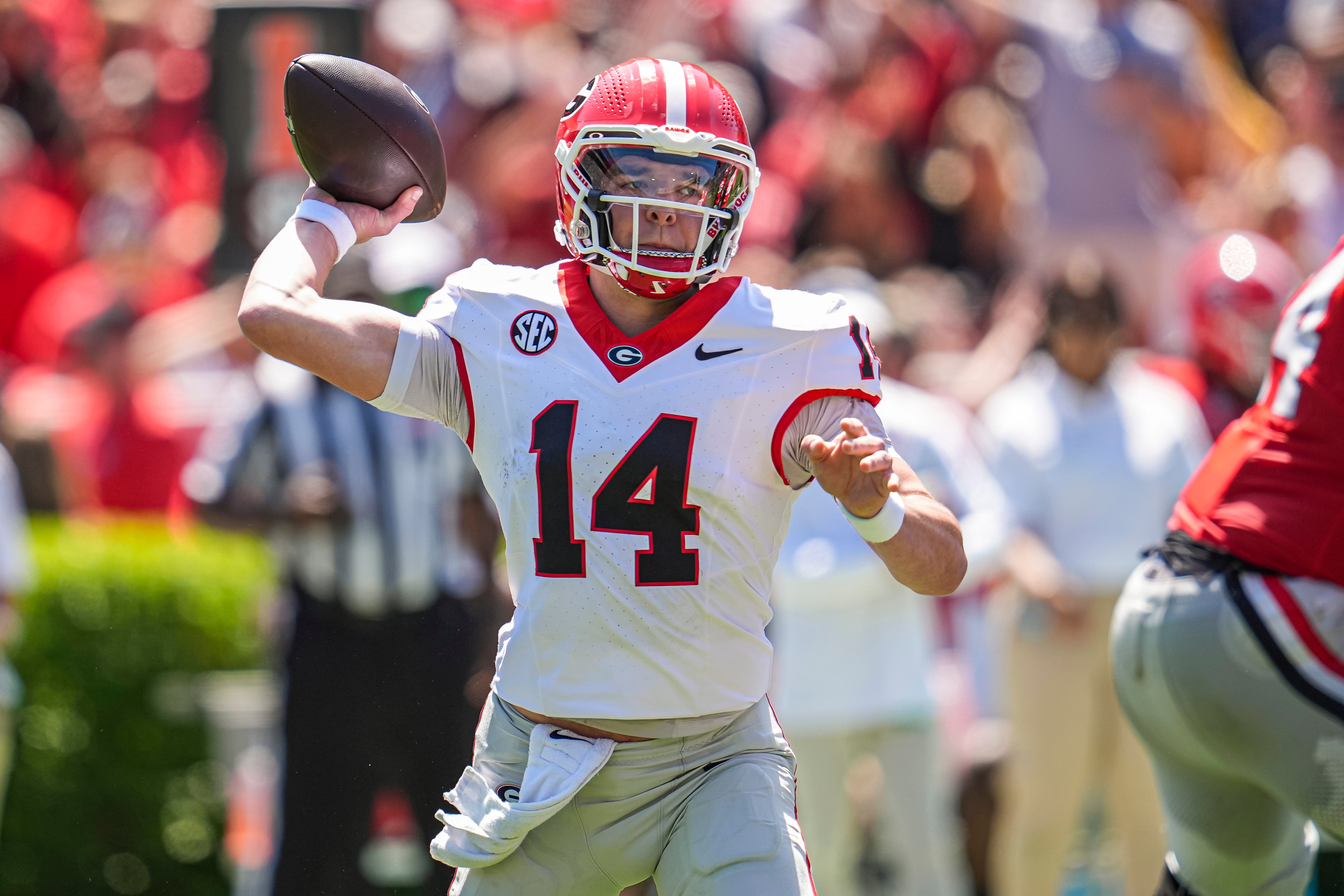 Georgia Bulldogs quarterback Gunner Stockton (14) passes during the Georgia Spring game at Sanford Stadium.