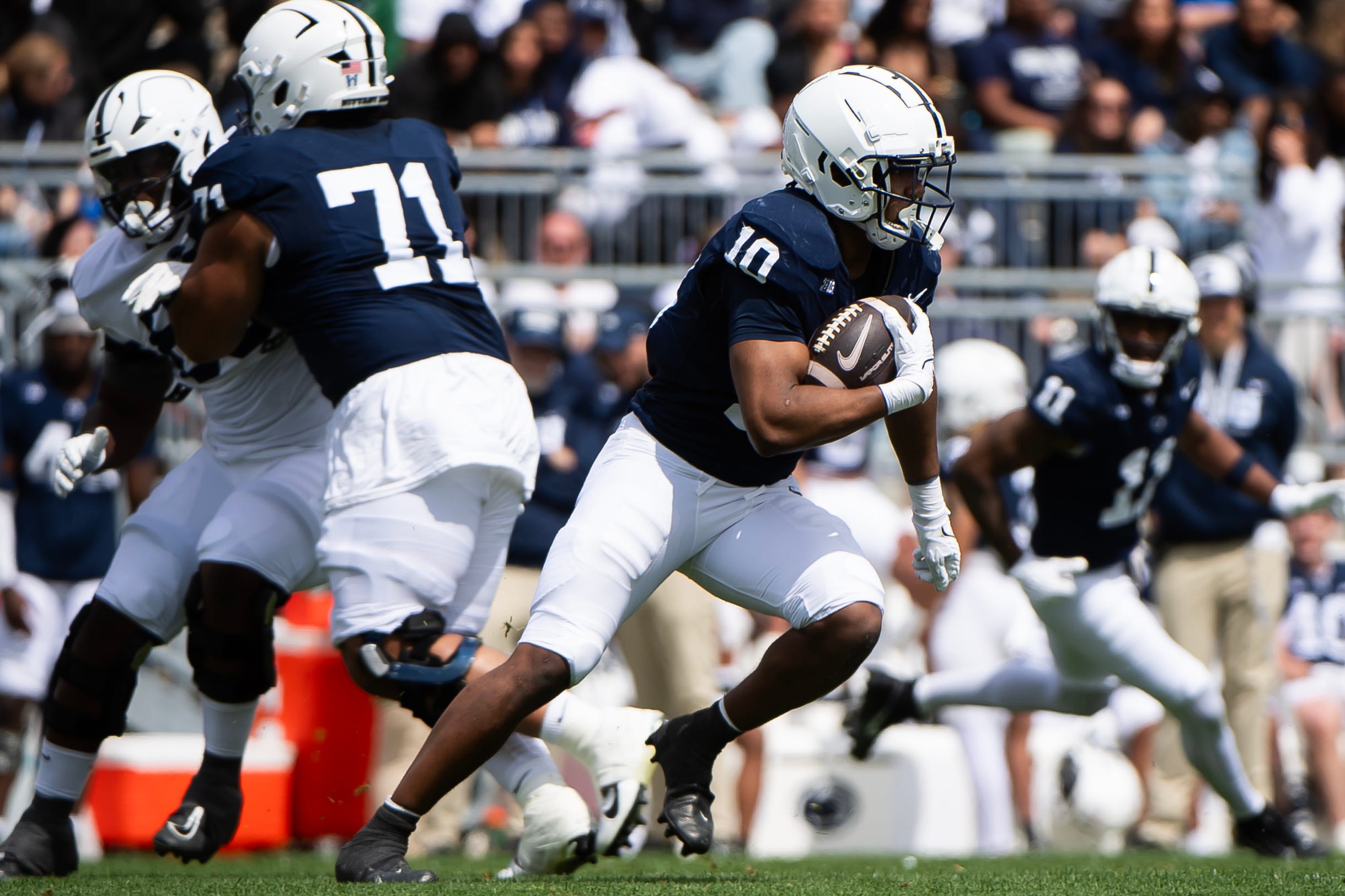 Penn State running back Nick Singleton carries the ball during the Blue-White game at Beaver Stadium on Saturday, April 26, 2025, in State College. The White team defeated the Blue team, 10-8.