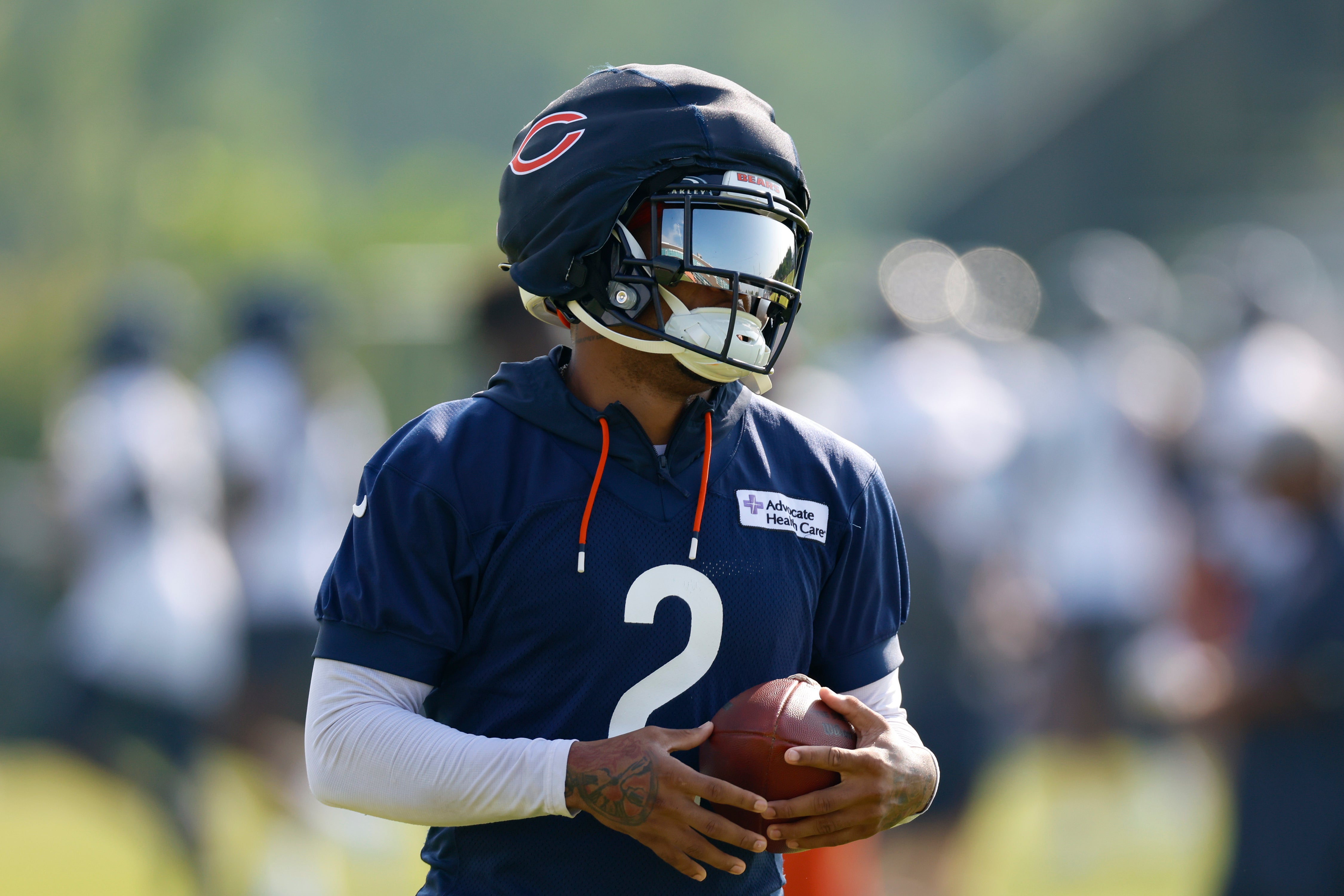 Chicago Bears wide receiver DJ Moore (2) runs with the ball during training camp at Halas Hall.