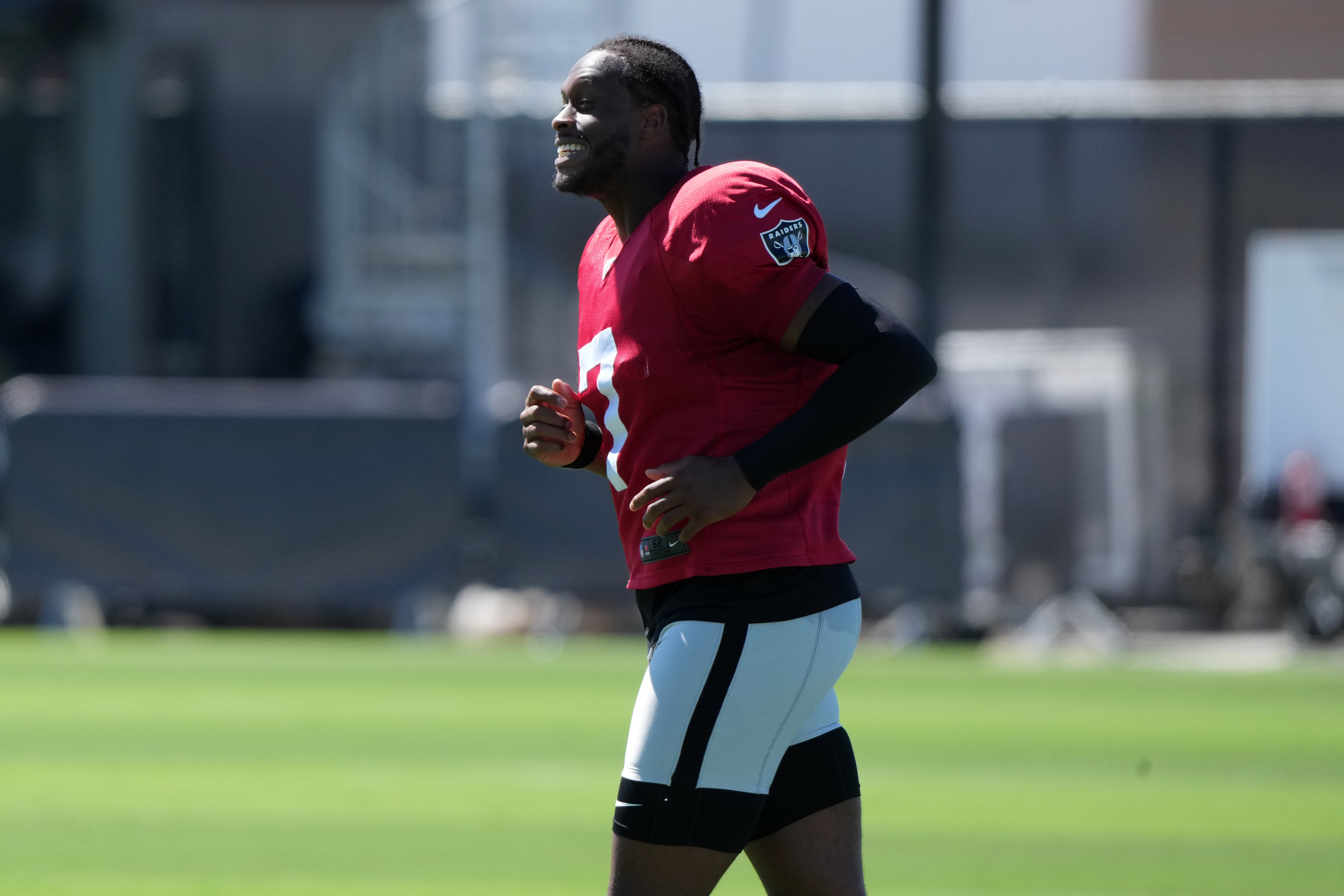 Jul 24, 2025; Henderson, NV, USA; Las Vegas Raiders quarterback Geno Smith (7) during training camp at the Intermountain Healthcare Performance Center. Mandatory Credit: Kirby Lee-Imagn Images