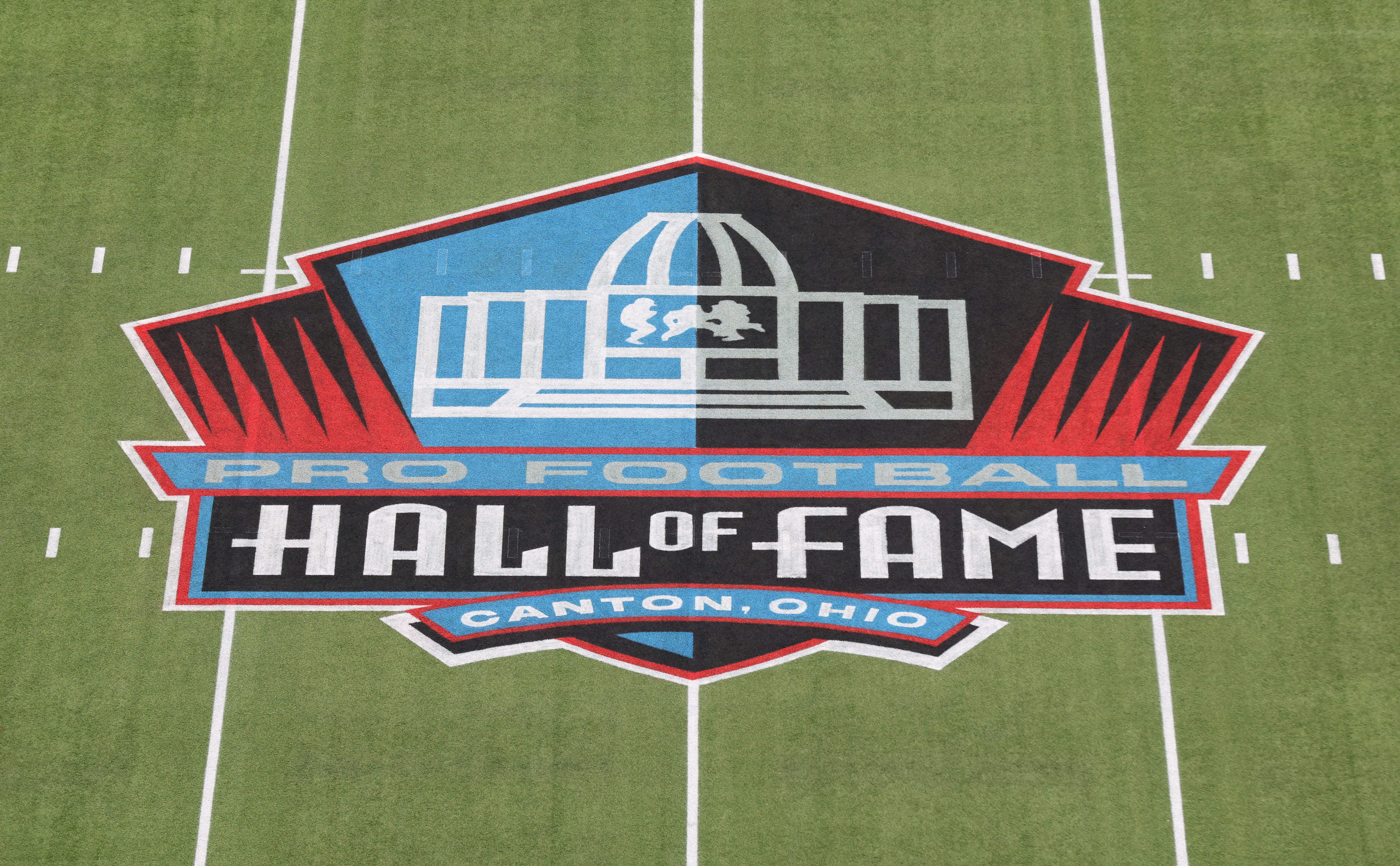 General view of the logo at mid-field at the Tom Benson Hall of Fame Stadium site of the Professional Football Hall of Fame game and Class of 2025 induction ceremonies.