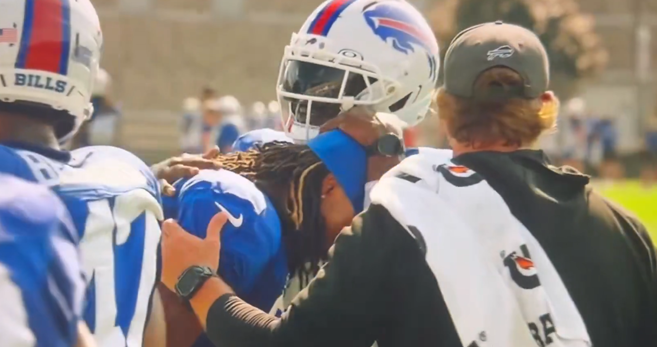 Buffalo Bills CB Tre'Davious White consoles CB Maxwell Hairston after suffering knee injury