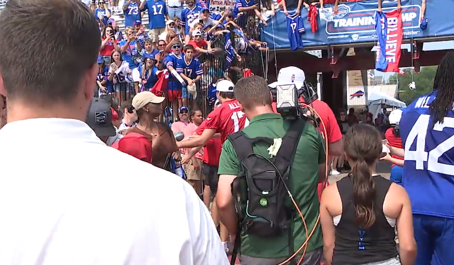 Buffalo Bills QB Josh Allen stops to sign autographs for fans after practice at St John Fisher University
