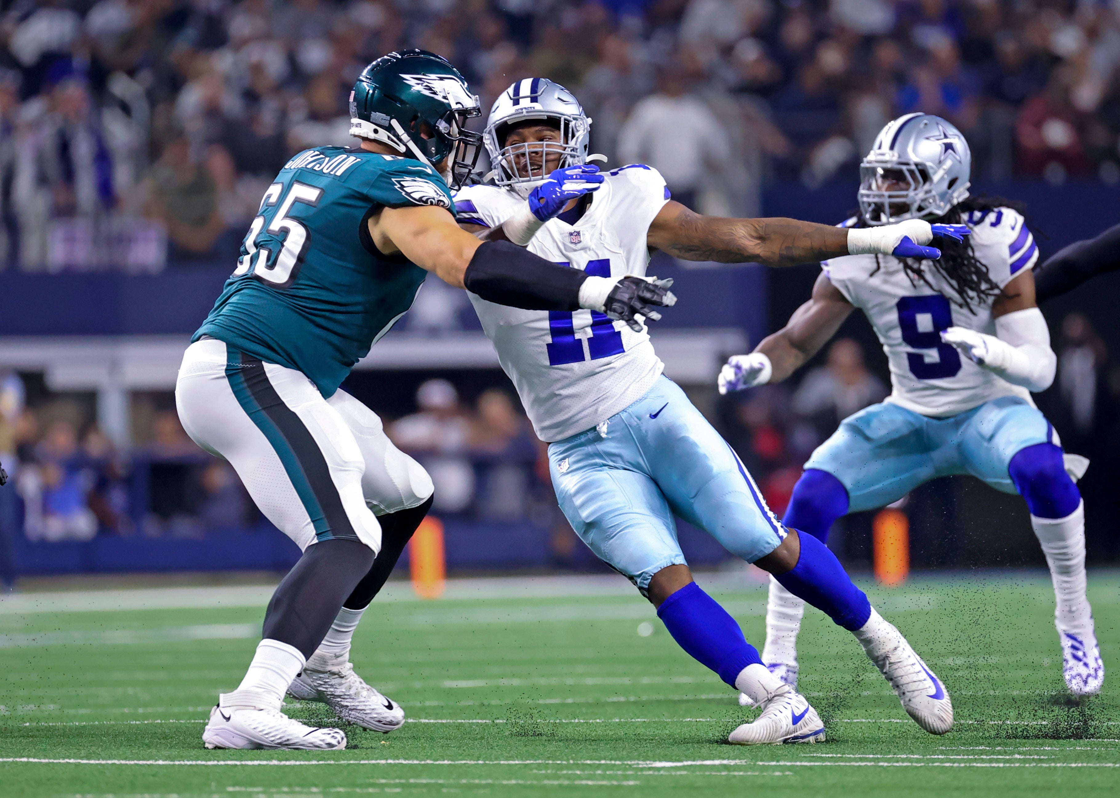 Dallas Cowboys linebacker Micah Parsons (11) and Philadelphia Eagles offensive tackle Lane Johnson (65) in action during the game at AT&T Stadium. Kevin Jairaj-Imagn Images