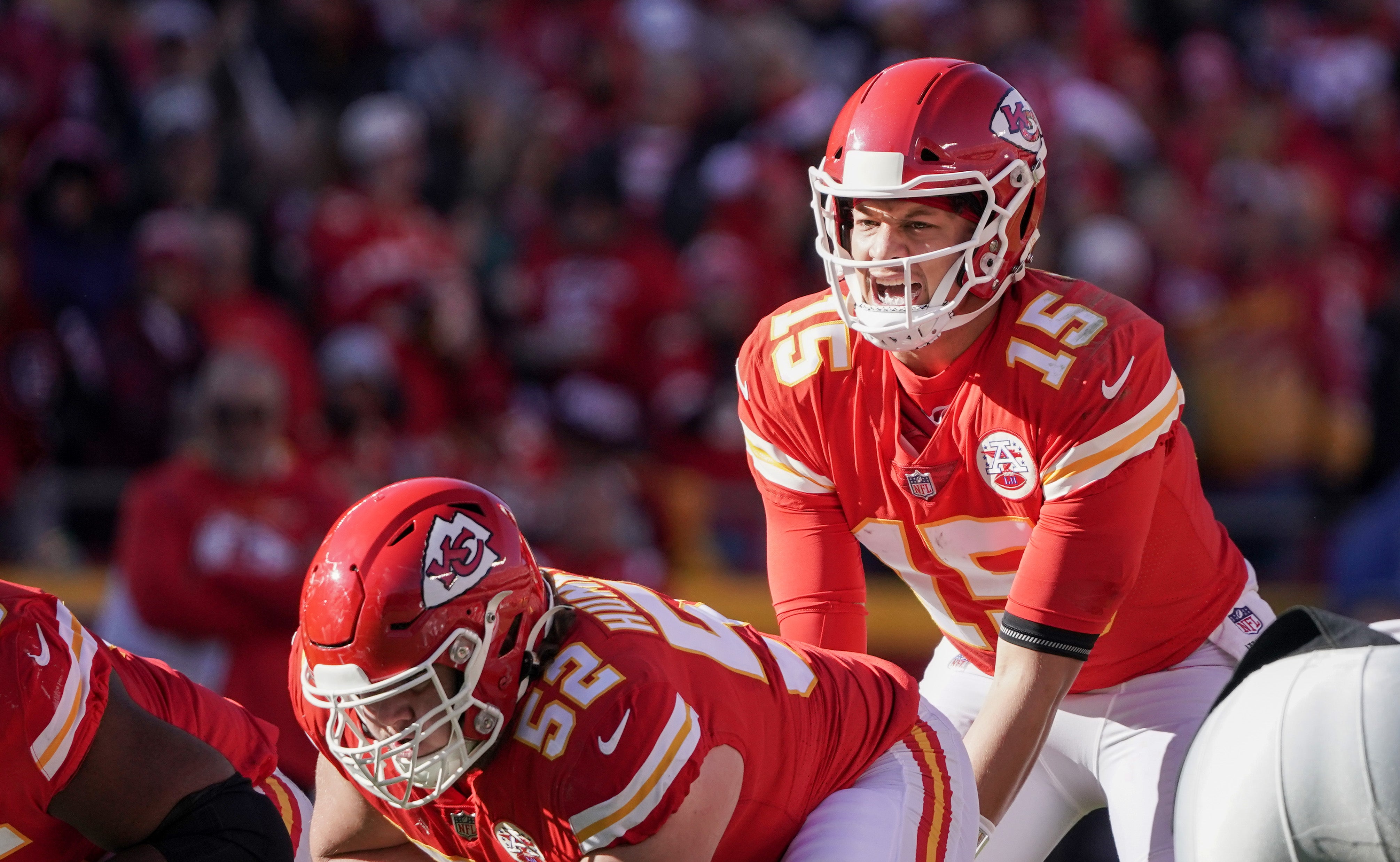 Kansas City Chiefs quarterback Patrick Mahomes (15) goes under center against the Las Vegas Raiders during the game at GEHA Field at Arrowhead Stadium.