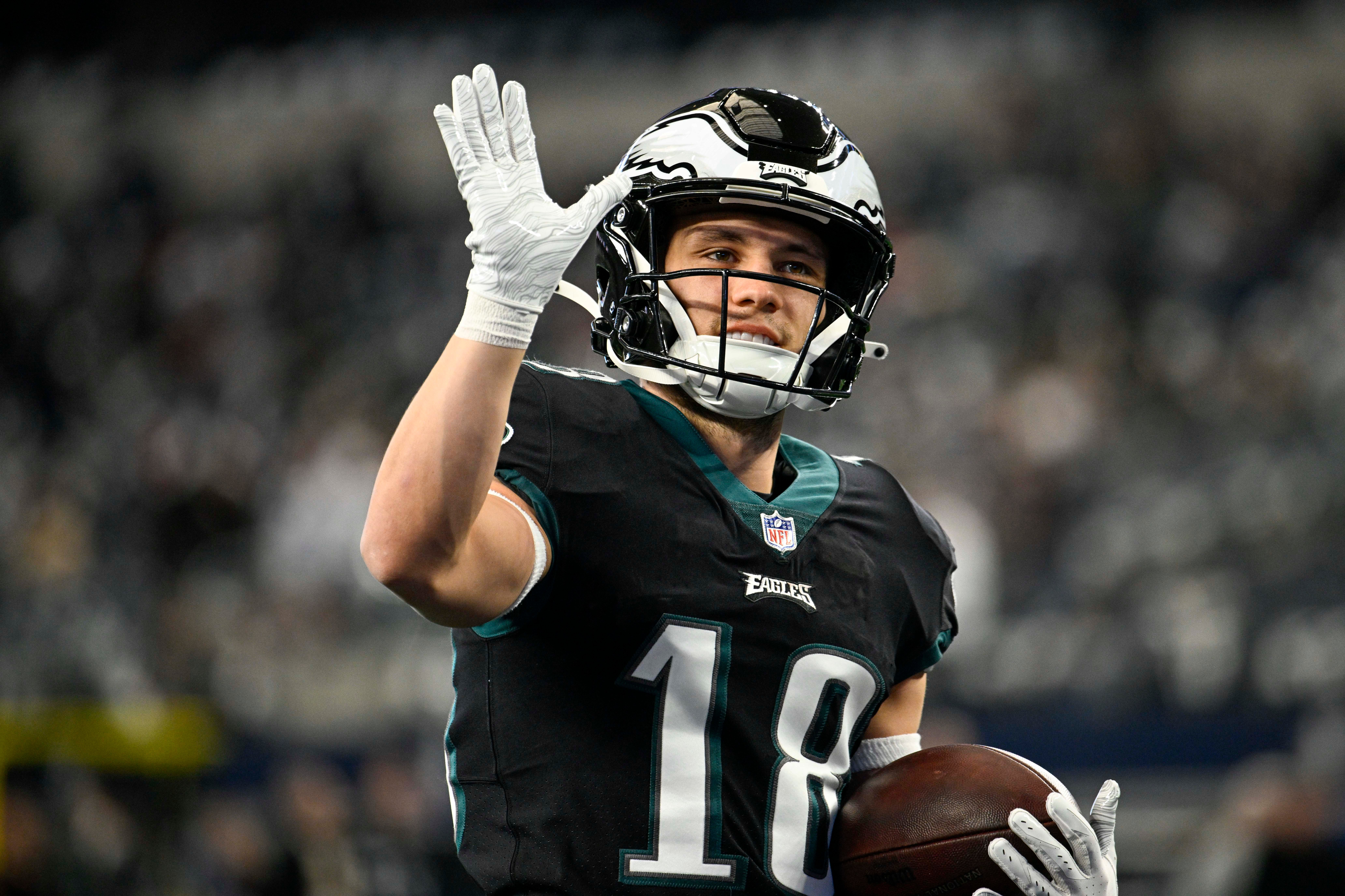 Philadelphia Eagles wide receiver Britain Covey (18) waves to the crowd before the game between the Dallas Cowboys and the Philadelphia Eagles at AT&T Stadium.
