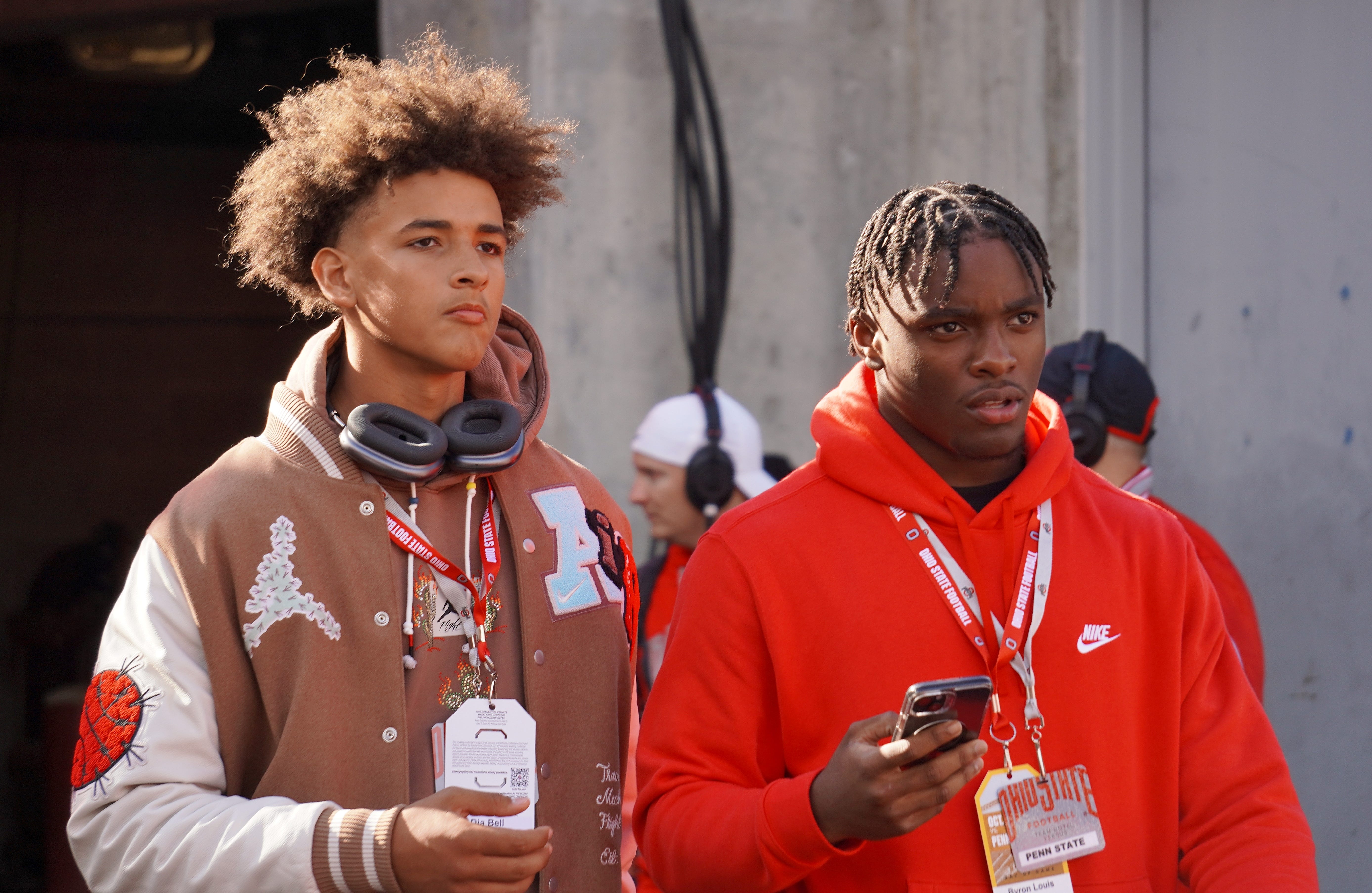 Recruits Dia Bell and Byron Louis watch Ohio State warm up before playing Penn State Oct. 21, 2023 at Ohio Stadium.