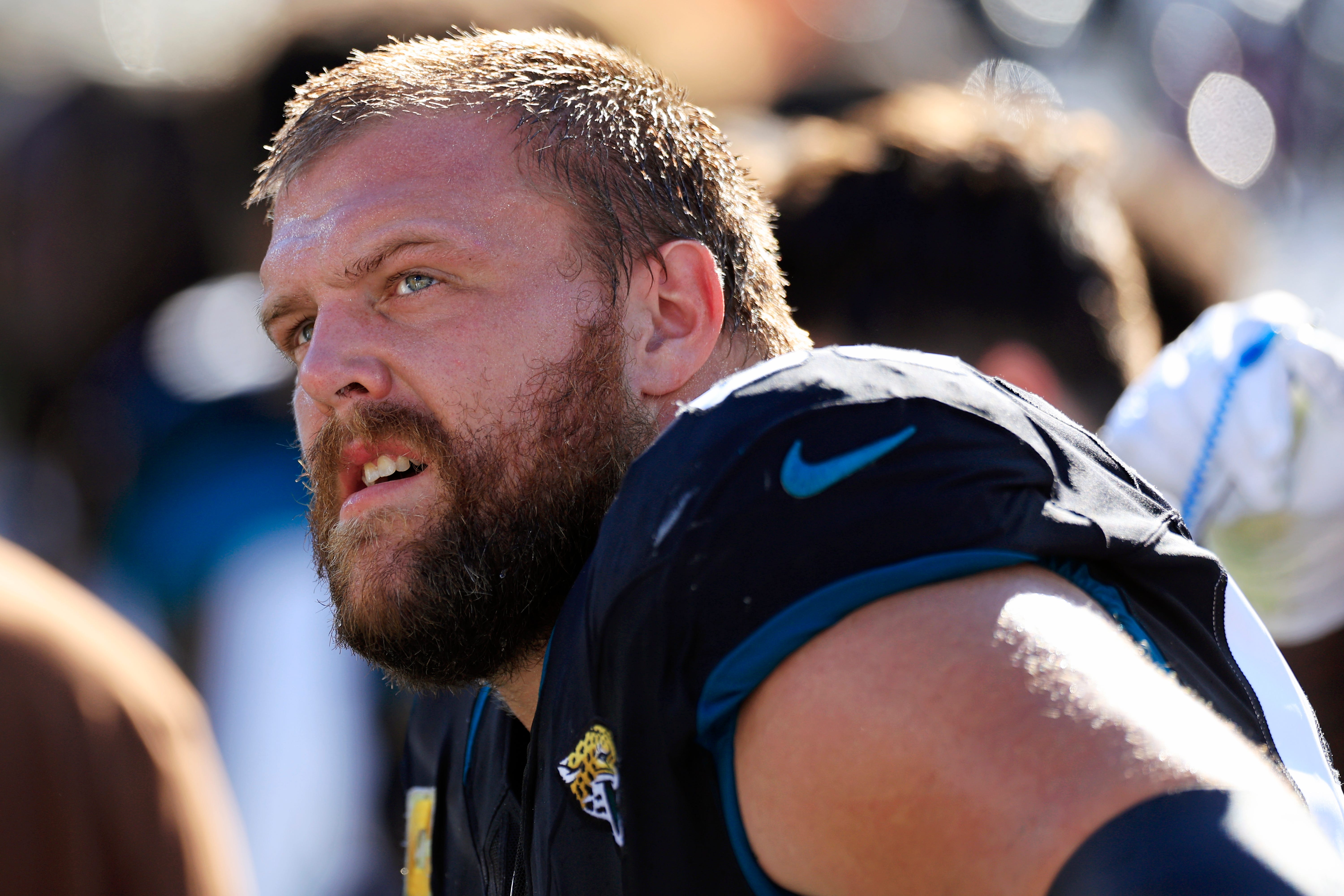 Jacksonville Jaguars guard Brandon Scherff (68) looks on from the sideline during the second quarter an NFL football matchup Sunday, Nov. 19, 2023 at EverBank Stadium in Jacksonville, Fla. The Jacksonville Jaguars defeated the Tennessee Titans 34-14.