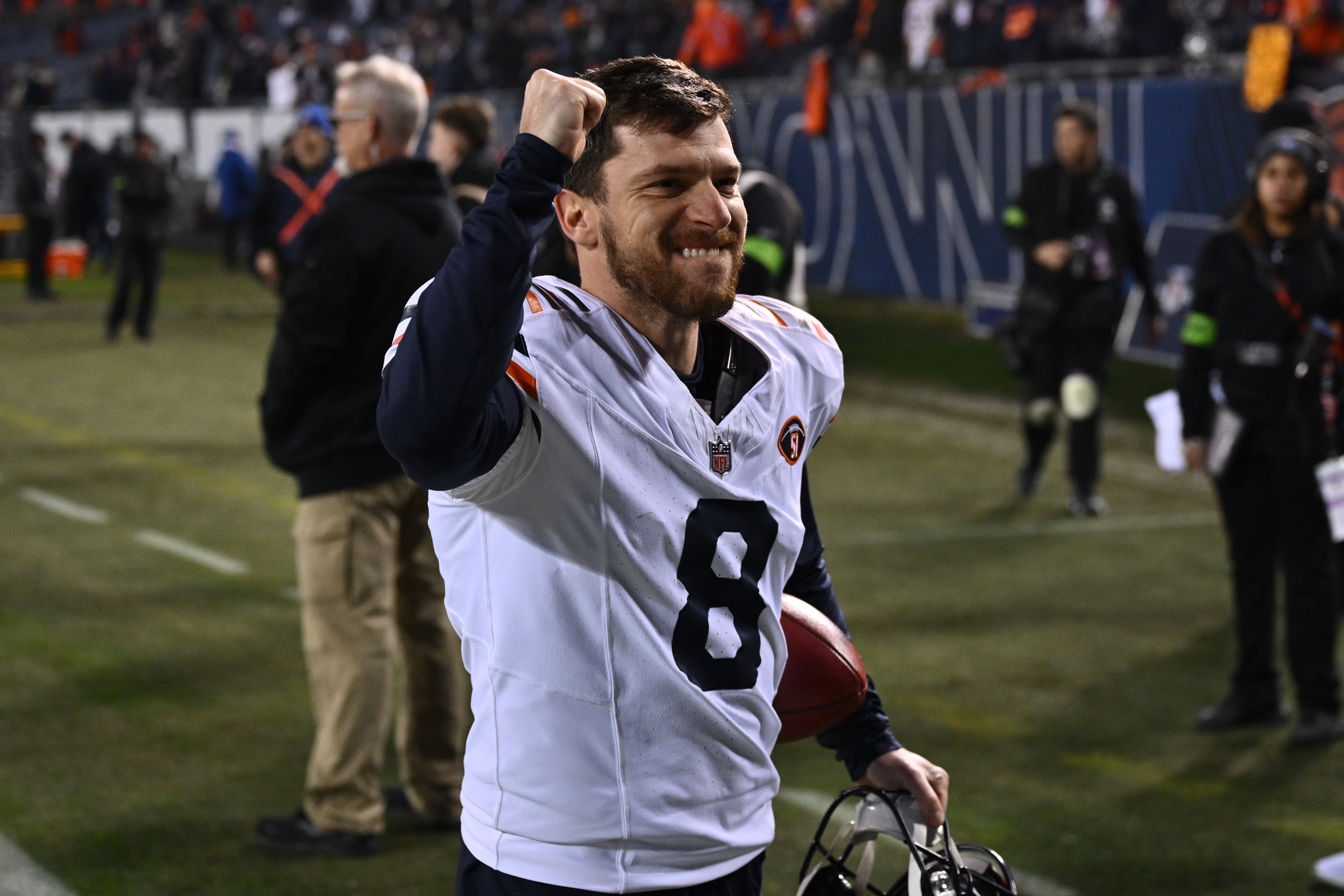 Dec 24, 2023; Chicago, Illinois, USA; Chicago Bears kicker Cairo Santos (8) celebrates as he runs off the field after Chicago defeated the Arizona Cardinals at Soldier Field.