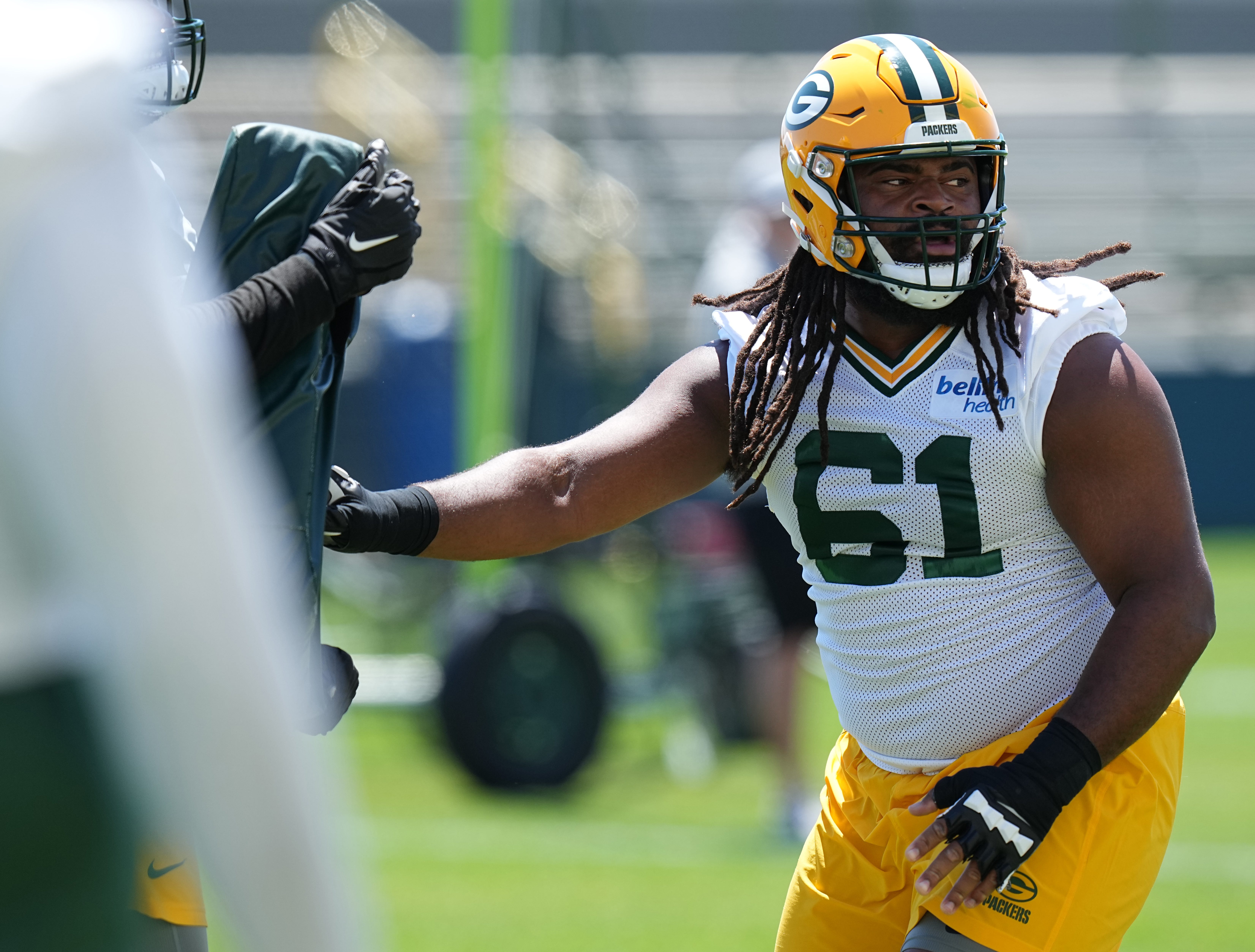 Green Bay Packers offensive lineman Lecitus Smith (61) is shown during organized team activities Wednesday, May 29, 2024 in Green Bay, Wisconsin.