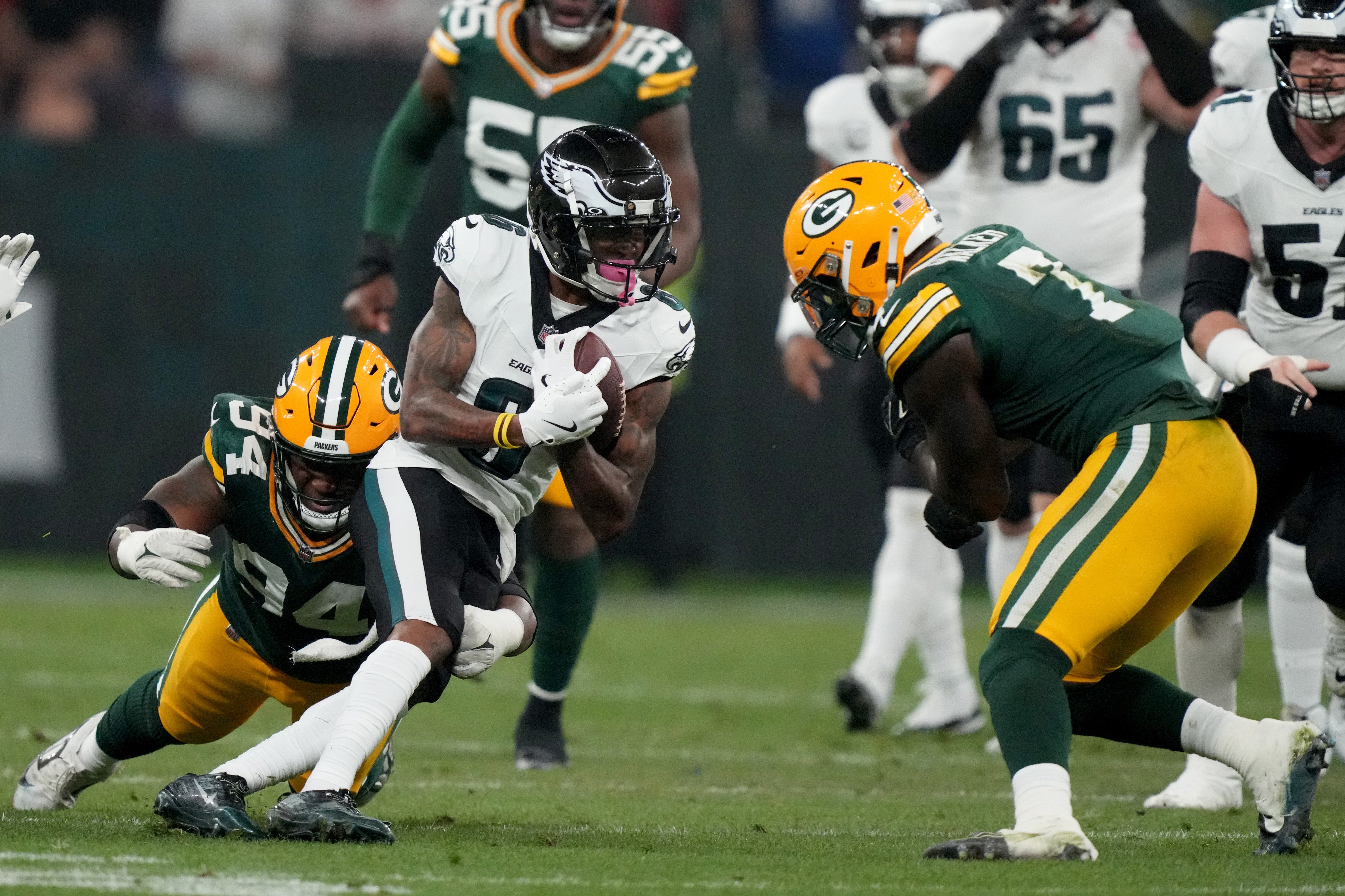 Sep 6, 2024; Sao Paulo, BRA; Philadelphia Eagles wide receiver DeVonta Smith (6) runs against Green Bay Packers defensive end Karl Brooks (94) and linebacker Quay Walker (7) during the first quarter at Neo Quimica Arena.
