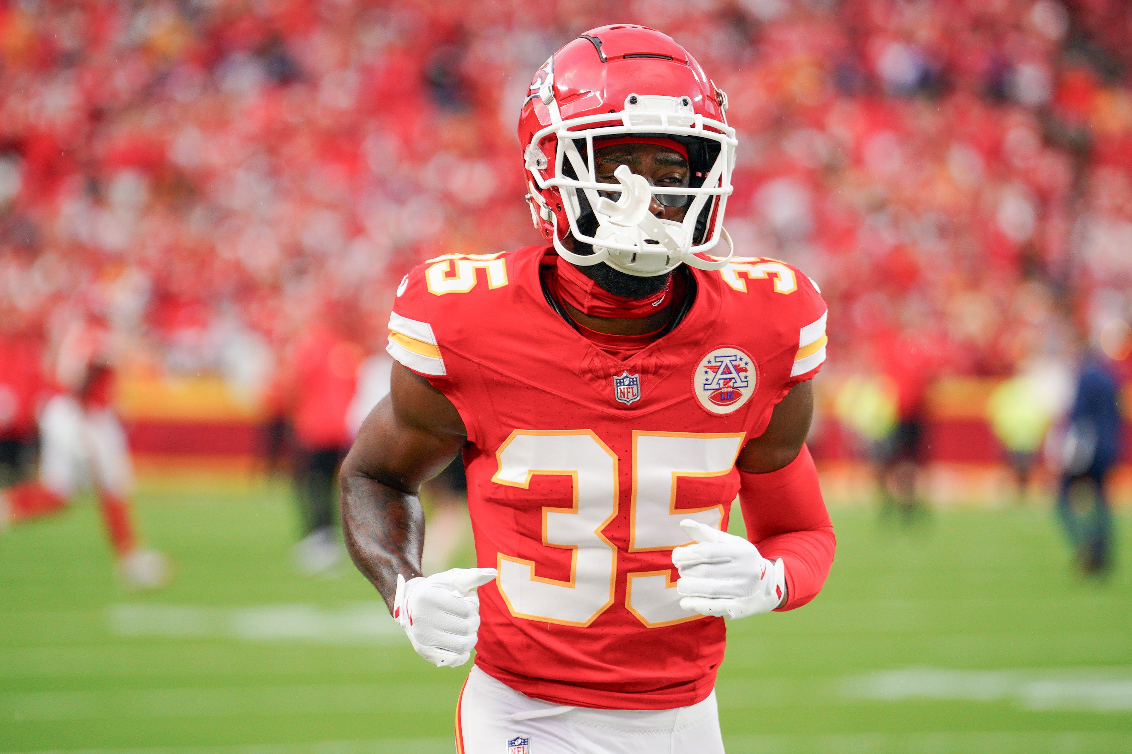 Kansas City Chiefs cornerback Jaylen Watson (35) runs on field against the Baltimore Ravens prior to a game at GEHA Field at Arrowhead Stadium.