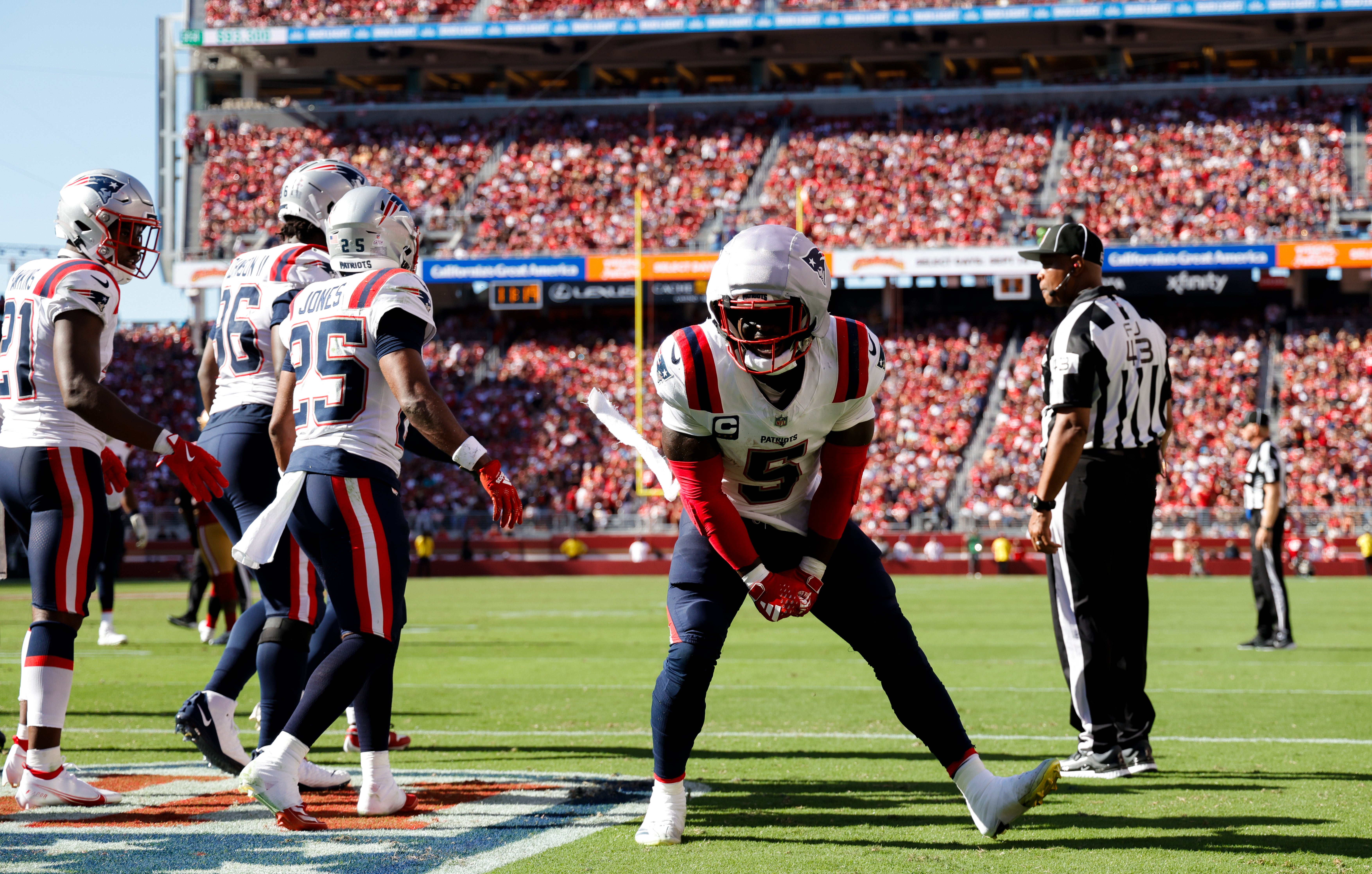 Sep 29, 2024; Santa Clara, California, USA; New England Patriots safety Jabrill Peppers (5) celebrates with teammates after intercepting a pass during the fourth quarter against the San Francisco 49ers at Levi's Stadium.