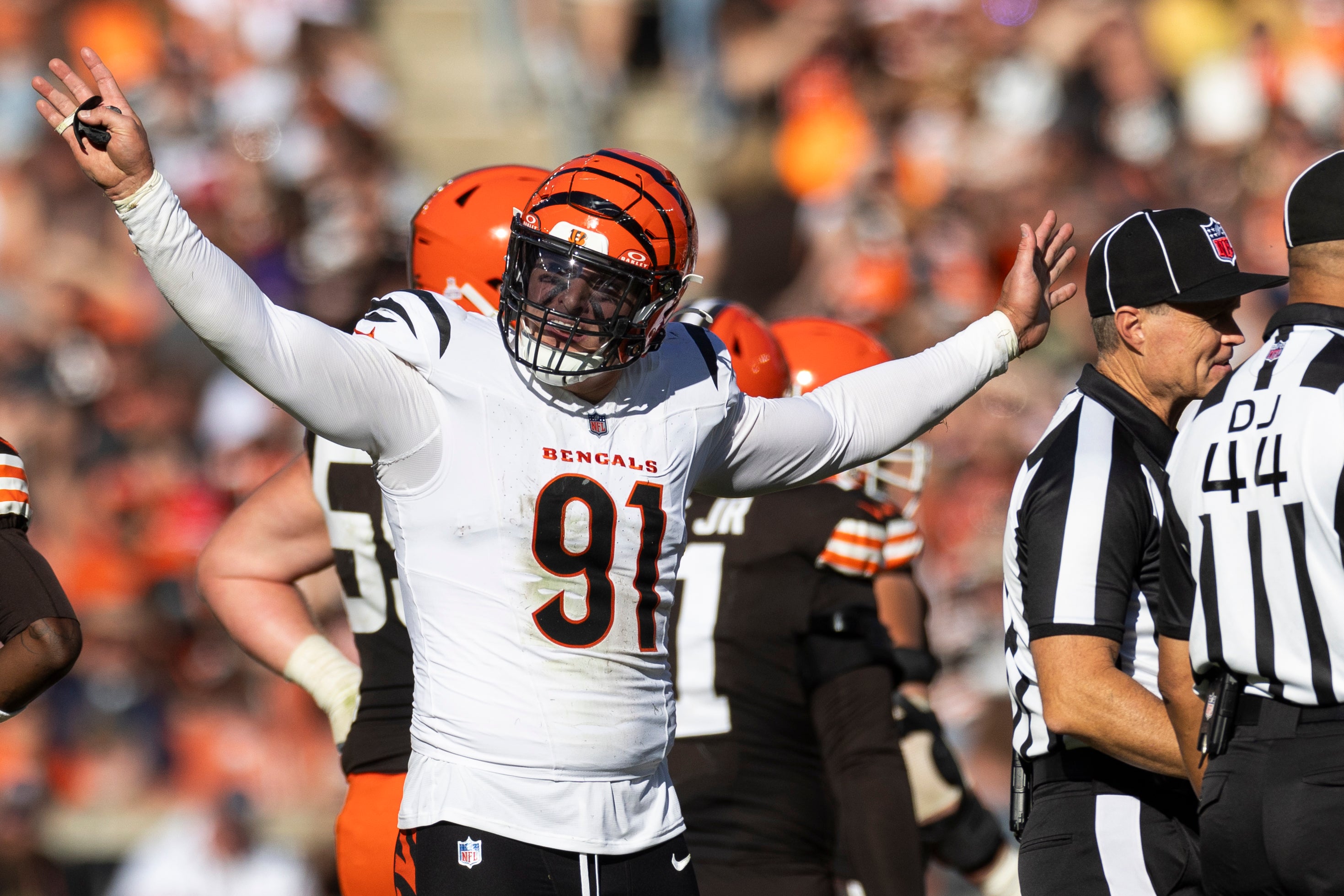 Oct 20, 2024; Cleveland, Ohio, USA; Cincinnati Bengals defensive end Trey Hendrickson (91) reacts following penalty flags being thrown during the fourth quarter against the Cleveland Browns at Huntington Bank Field. The penalties were against the Browns.