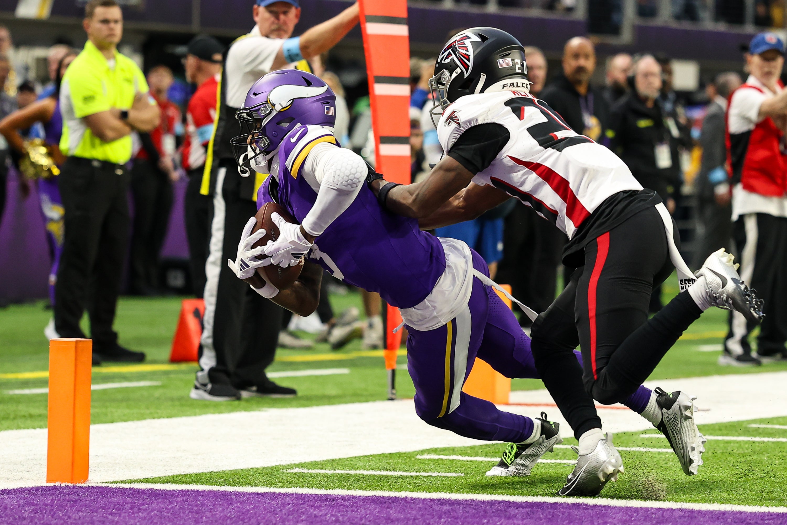 Minnesota Vikings wide receiver Jordan Addison (3) dives for a touchdown against the Atlanta Falcons during the fourth quarter at U.S. Bank Stadium.
