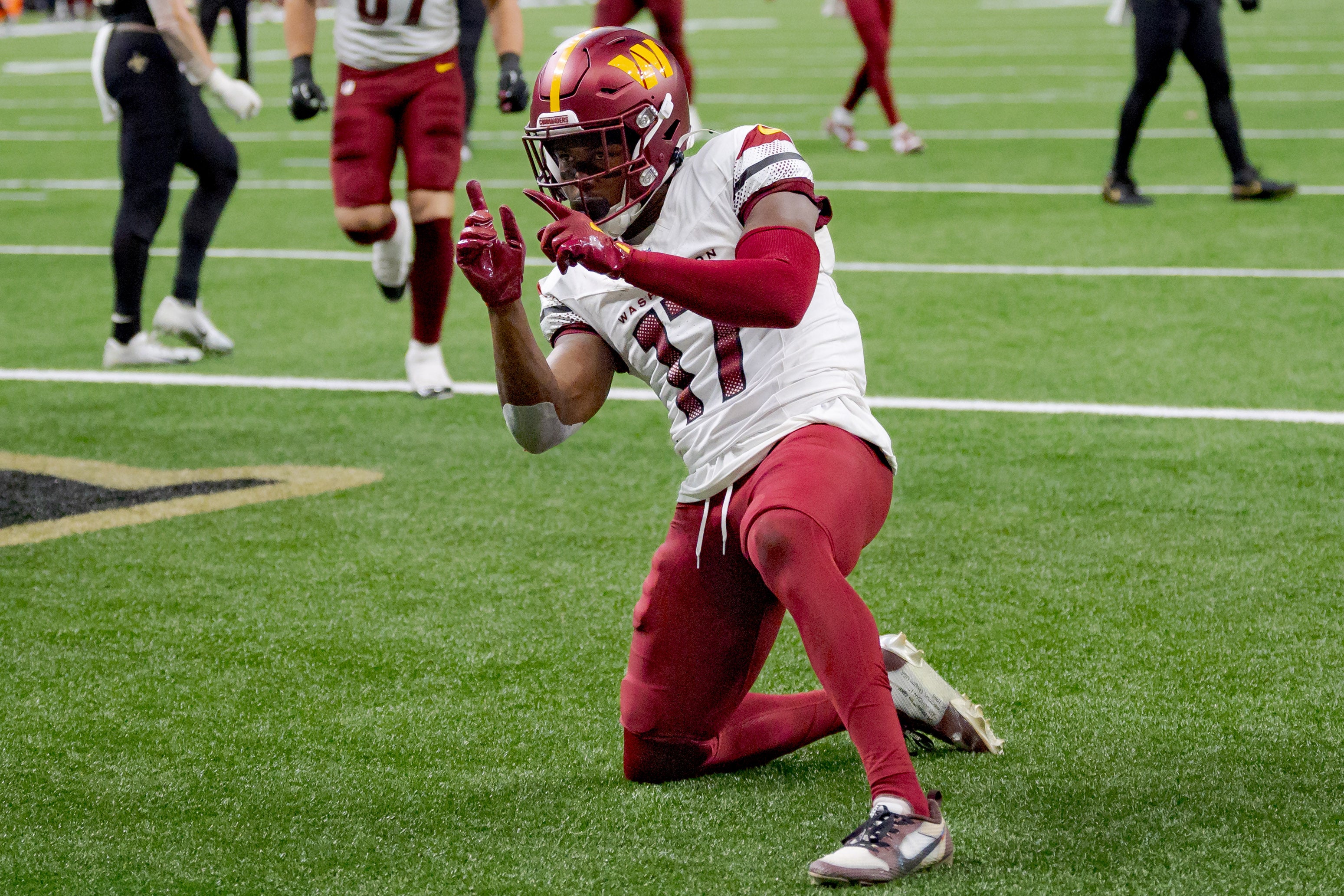 Washington Commanders wide receiver Terry McLaurin (17) celebrates a touchdown against the New Orleans Saints cornerback Kool-Aid McKinstry (14) during the first half at Caesars Superdome.