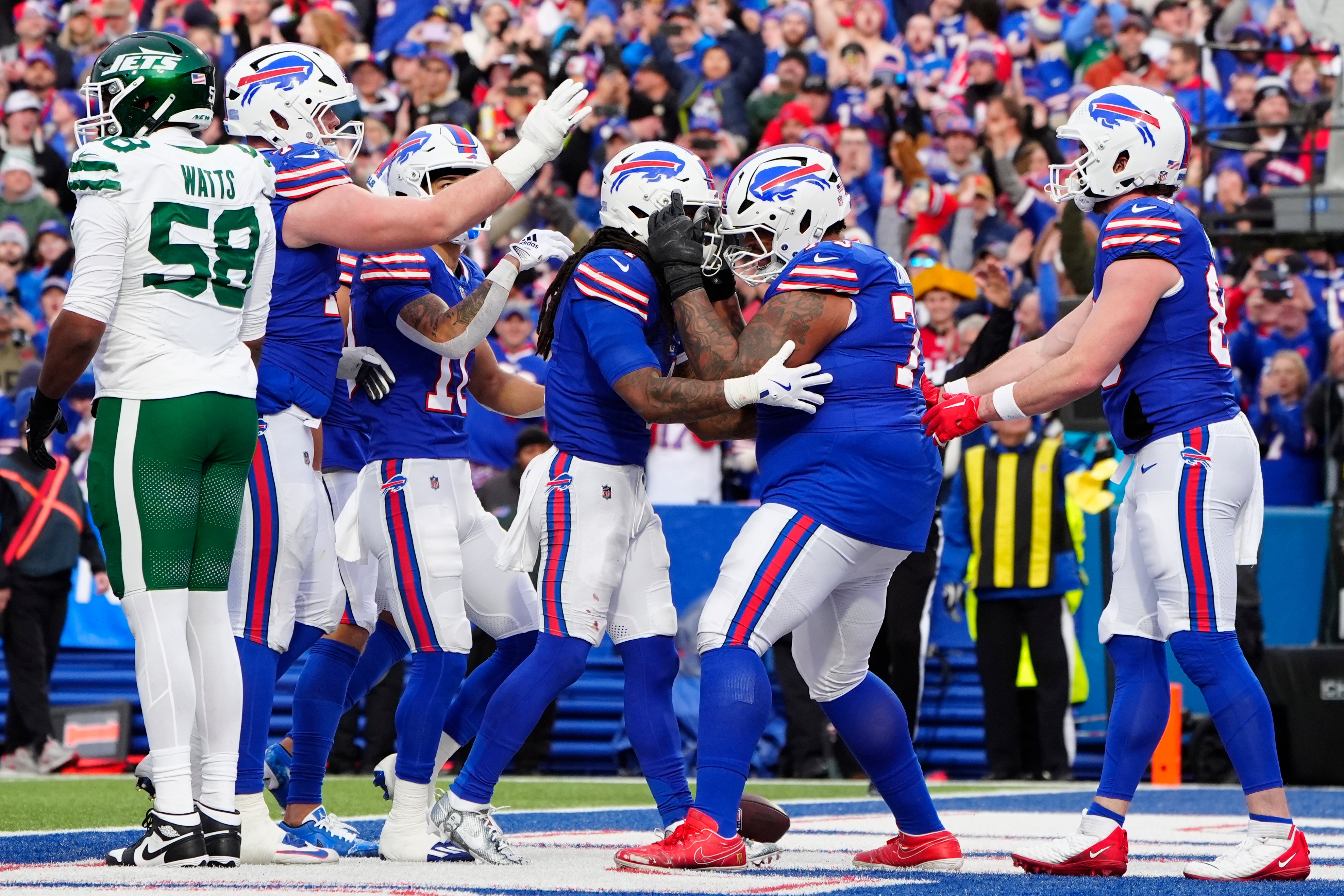 Buffalo Bills LT Dion Dawkins celebrates with team after TD
