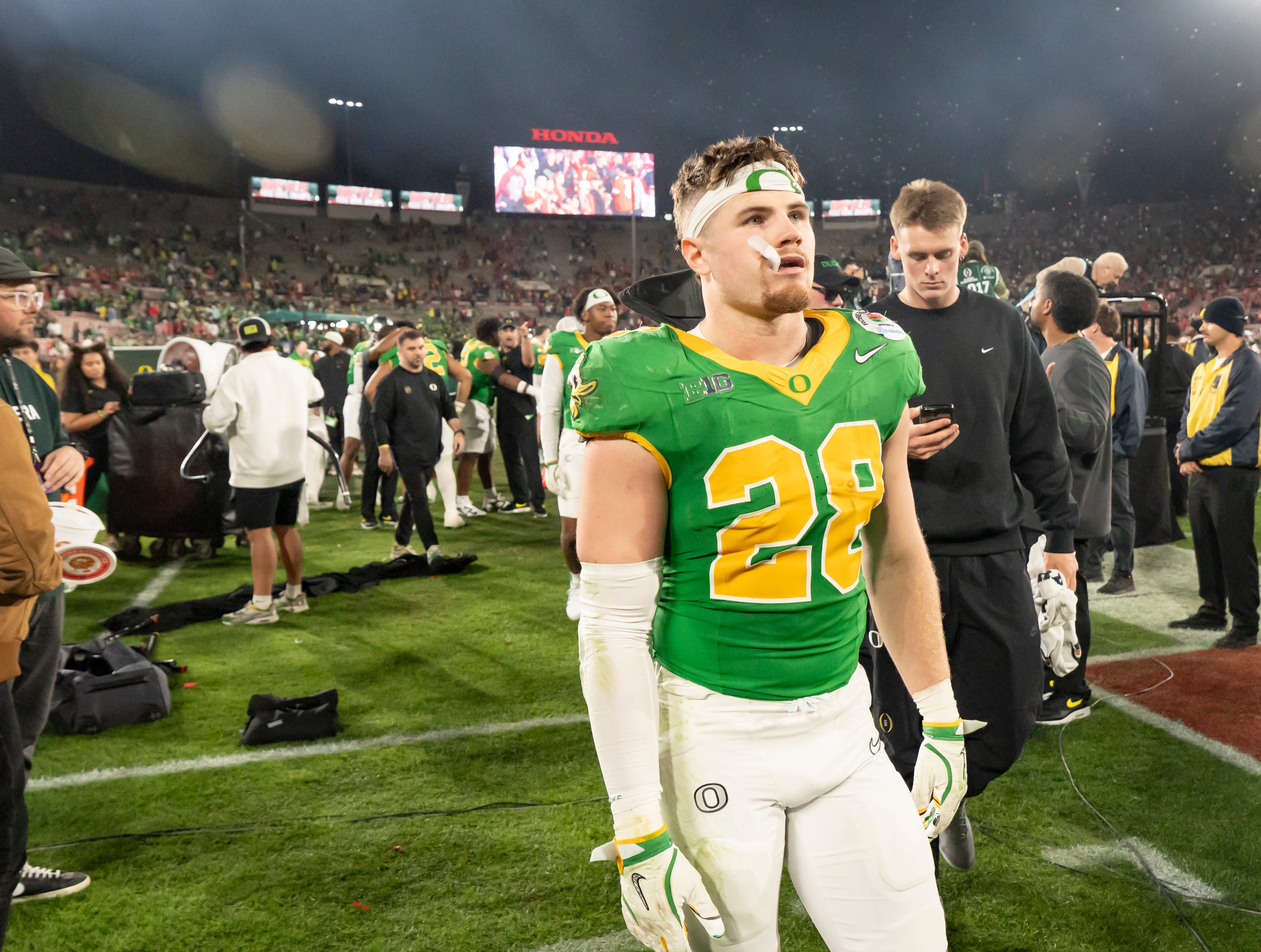 Oregon inside linebacker Bryce Boettcher walks off the field as the Oregon Ducks face the Ohio State Buckeyes Wednesday, Jan. 1, 2025, in the quarterfinal of the College Football Playoff at the Rose Bowl in Pasadena, Calif.