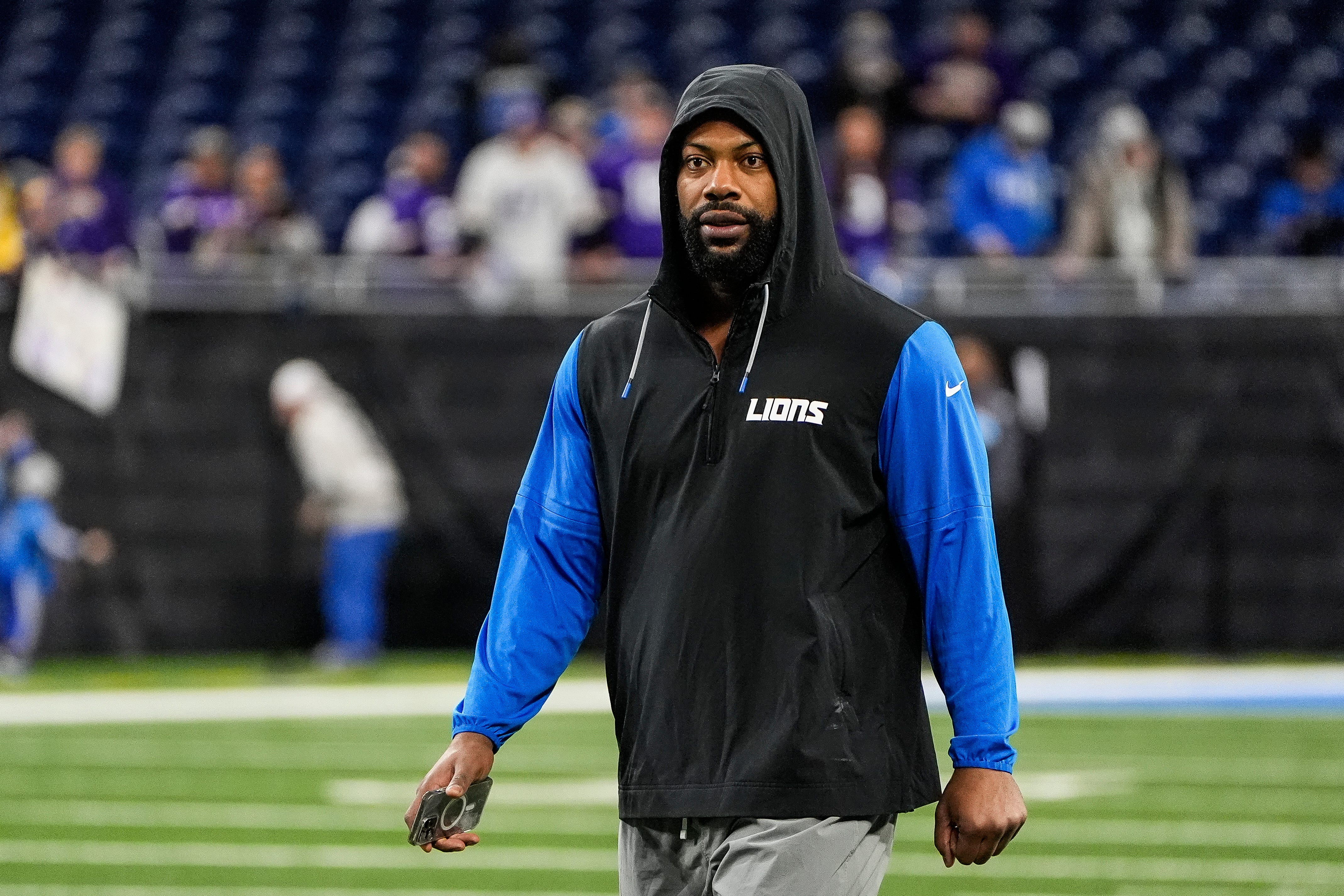 Detroit Lions defensive end Za'Darius Smith (99) warms up before the game between Detroit Lions and Minnesota Vikings at Ford Field in Detroit on Sunday, Jan. 5, 2025.