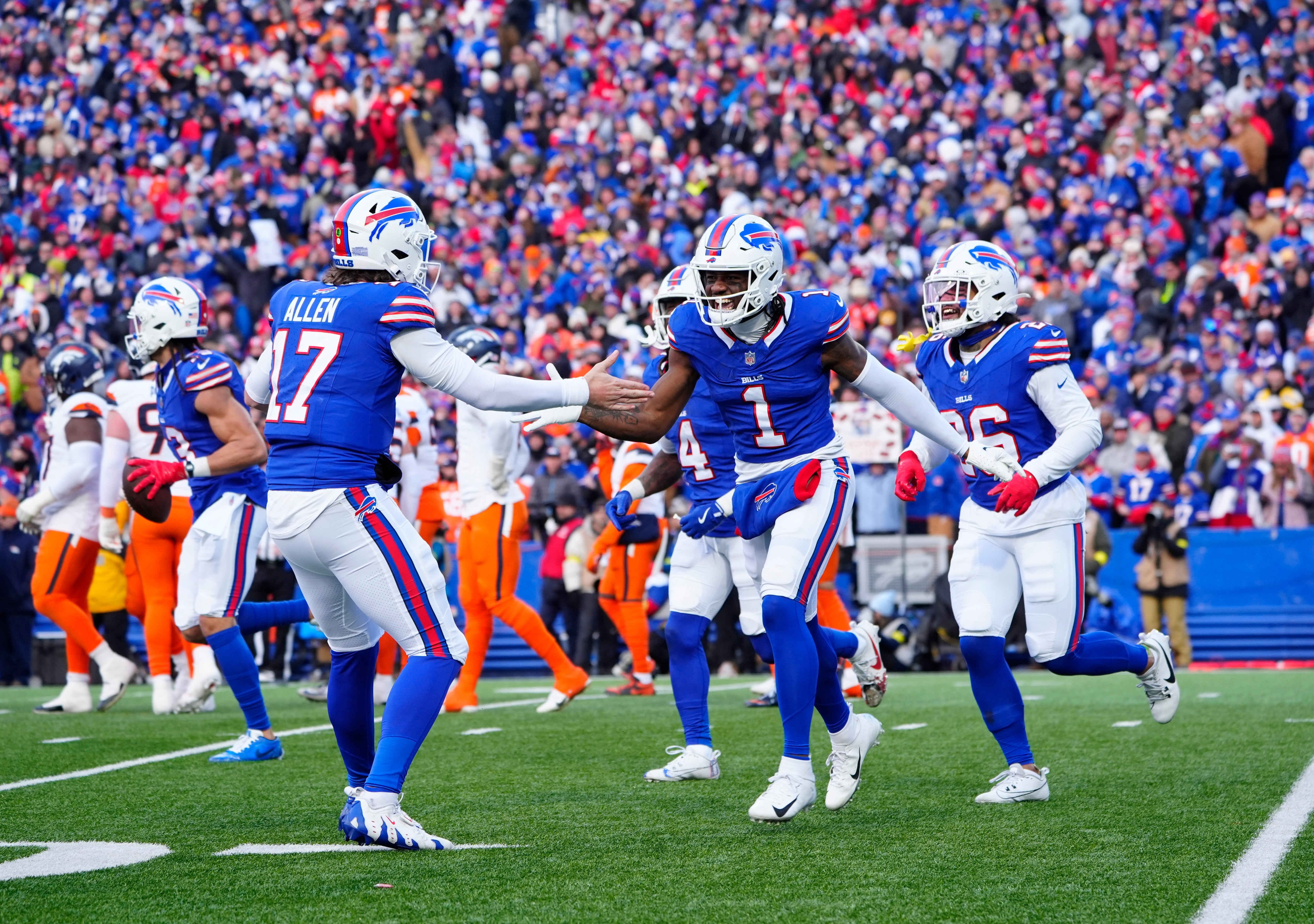 Buffalo Bills QB Josh Allen celebrates with WR Curtis Samuel after TD