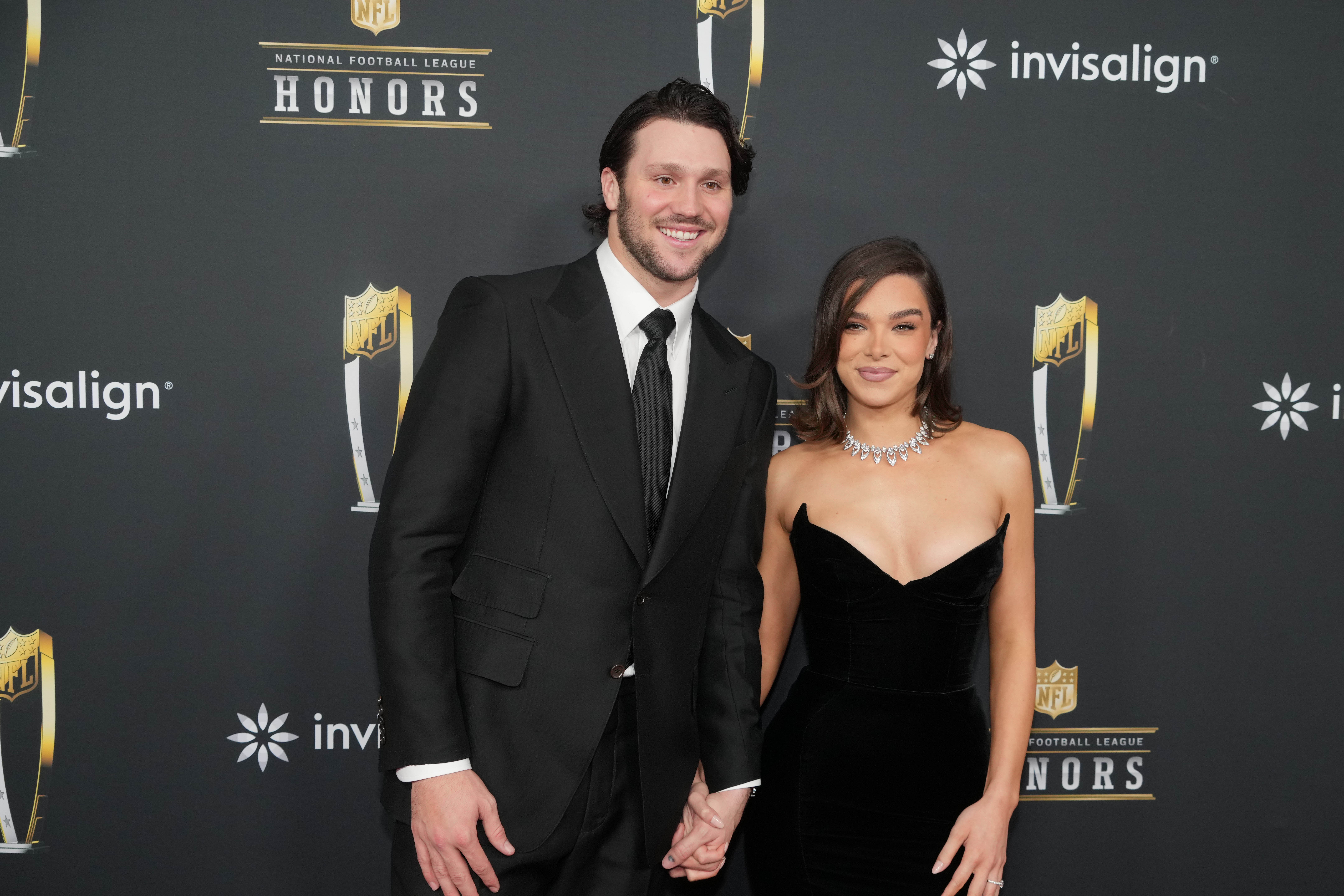 Buffalo Bills QB Josh Allen and then-fiancé Hailee Steinfeld stop for photos at the NFL awards show