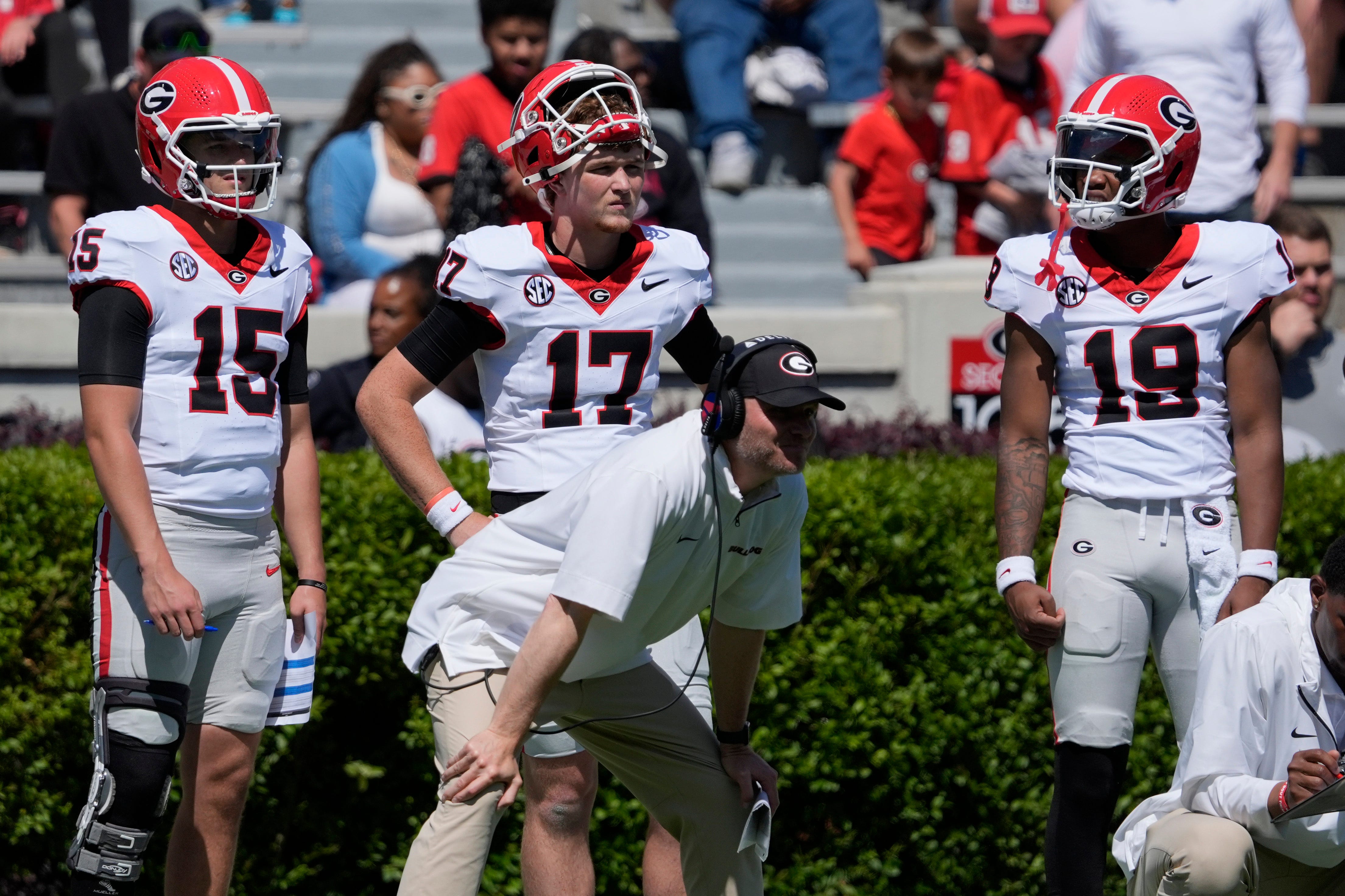 Georgia quarterbacks Ryan Montgomery (15), Colter Finn (17) and Hezekiah Millender (19) looks on during the Georgia G-Day spring football game in Athens, Ga., on Saturday, April 12, 2025