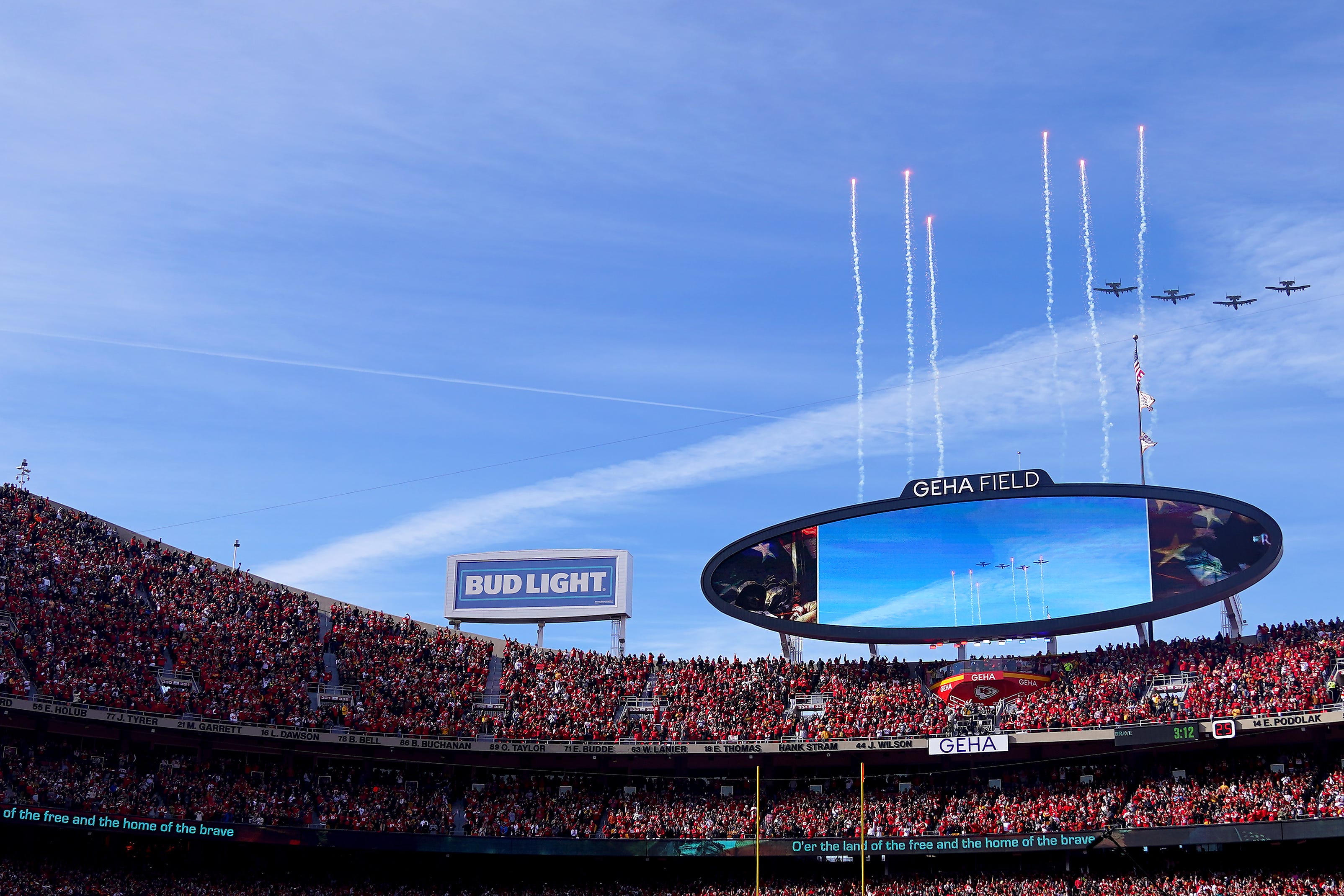 Military planes flyover as fireworks are fired before the first quarter during the AFC championship NFL football game between the Cincinnati Bengals and the Kansas City Chiefs at GEHA Field at Arrowhead Stadium
