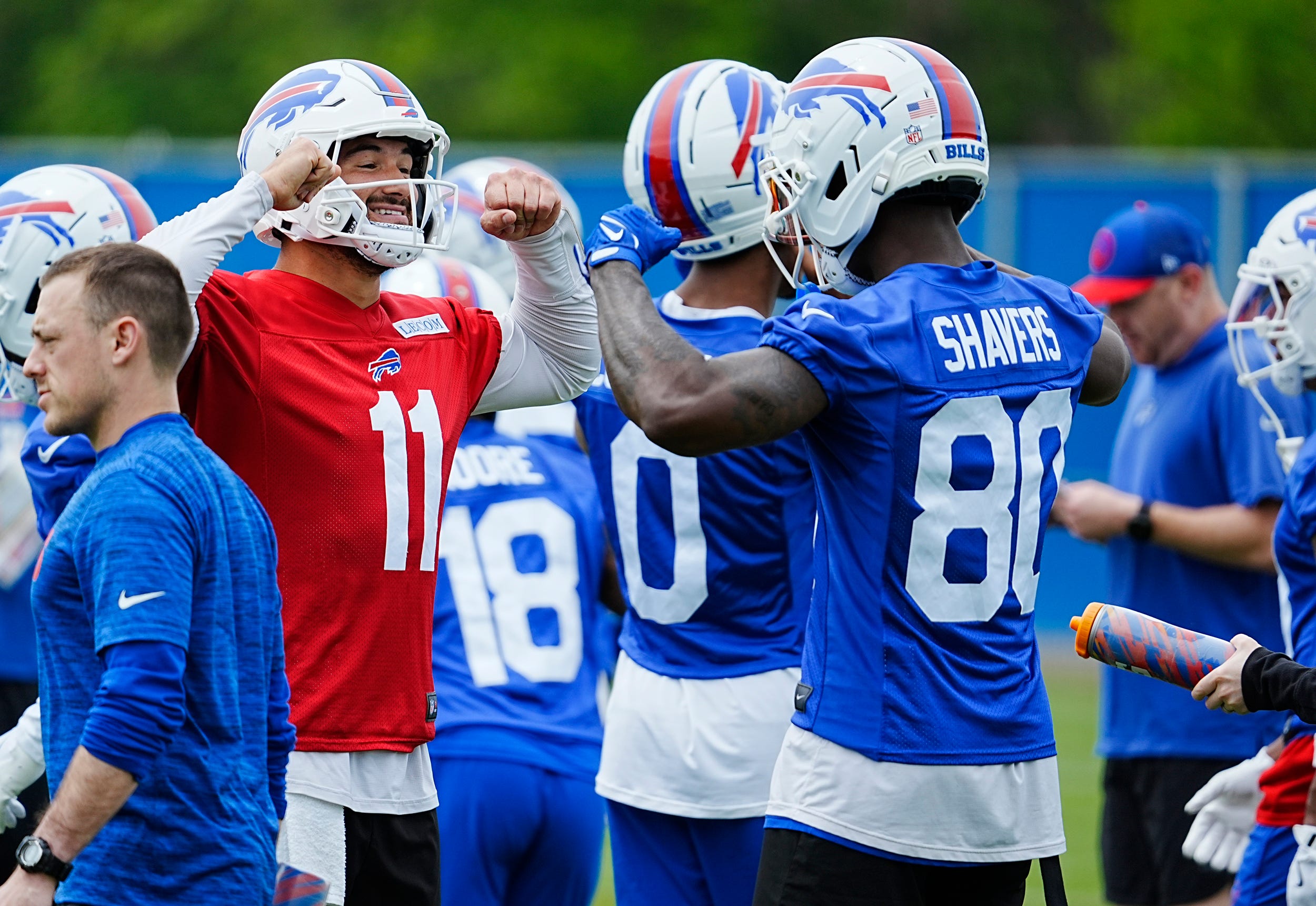 Buffalo Bills WR Tyrell Shavers celebrates with Mith Trubisky after practice