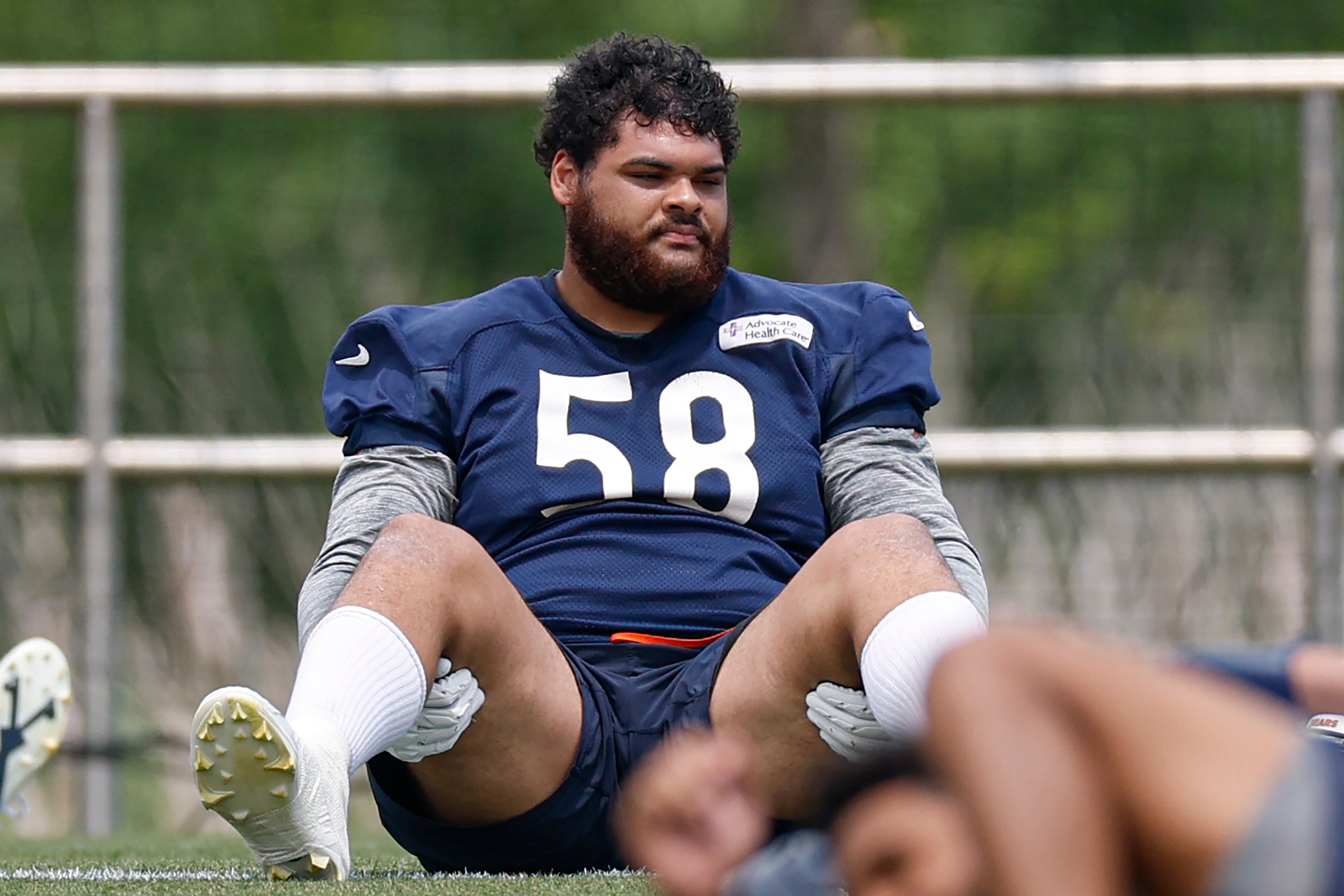 Jun 3, 2025; Lake Forest, IL, USA; Chicago Bears offensive tackle Darnell Wright (58) warms up during minicamp at Halas Hall.