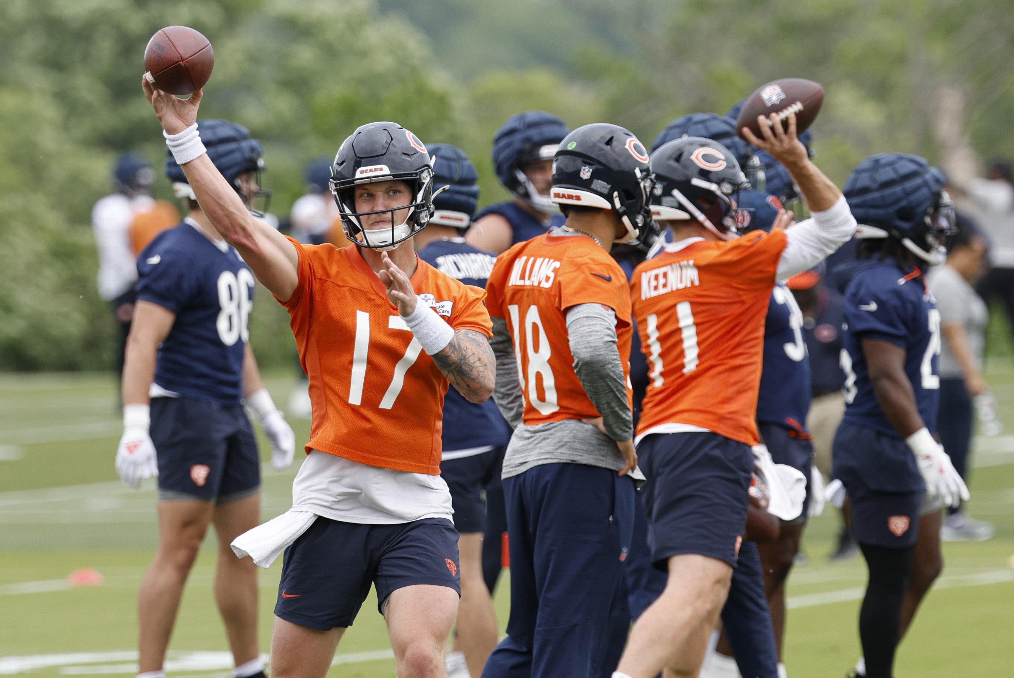 Jun 3, 2025; Lake Forest, IL, USA; Chicago Bears quarterback Tyson Bagent (17) passes the ball during minicamp at Halas Hall.