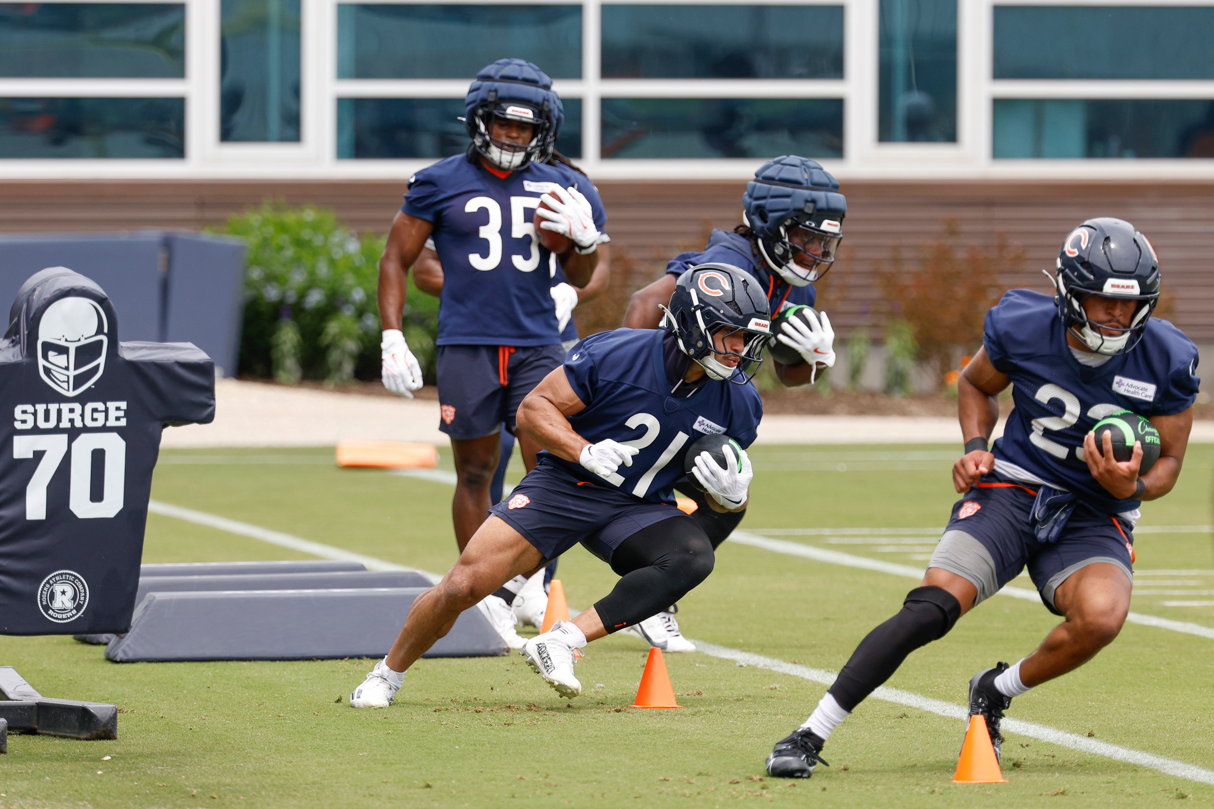 Jun 3, 2025; Lake Forest, IL, USA; Chicago Bears running back Travis Homer (21) runs with the ball during minicamp at Halas Hall.