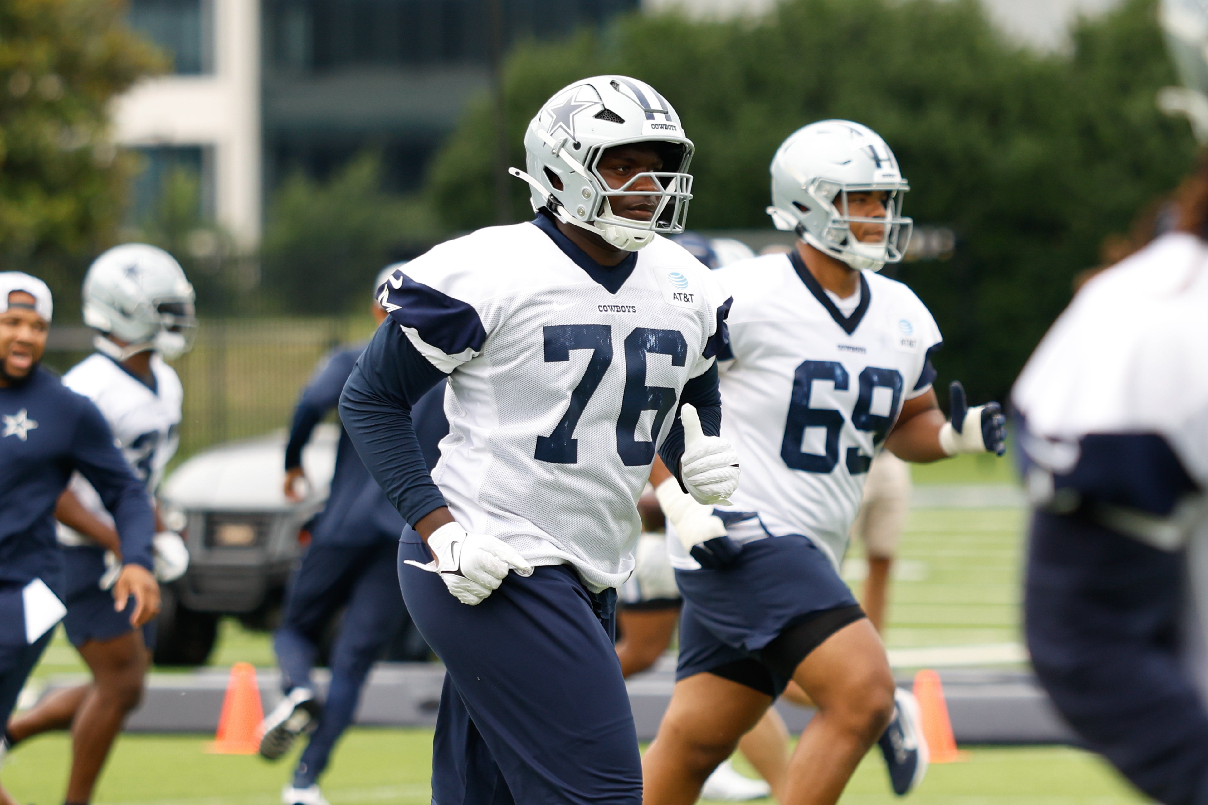 Dallas Cowboys offensive tackle Asim Richards (76) goes through a drill during practice at the Ford Center at the Star Training Facility in Frisco, Texas.