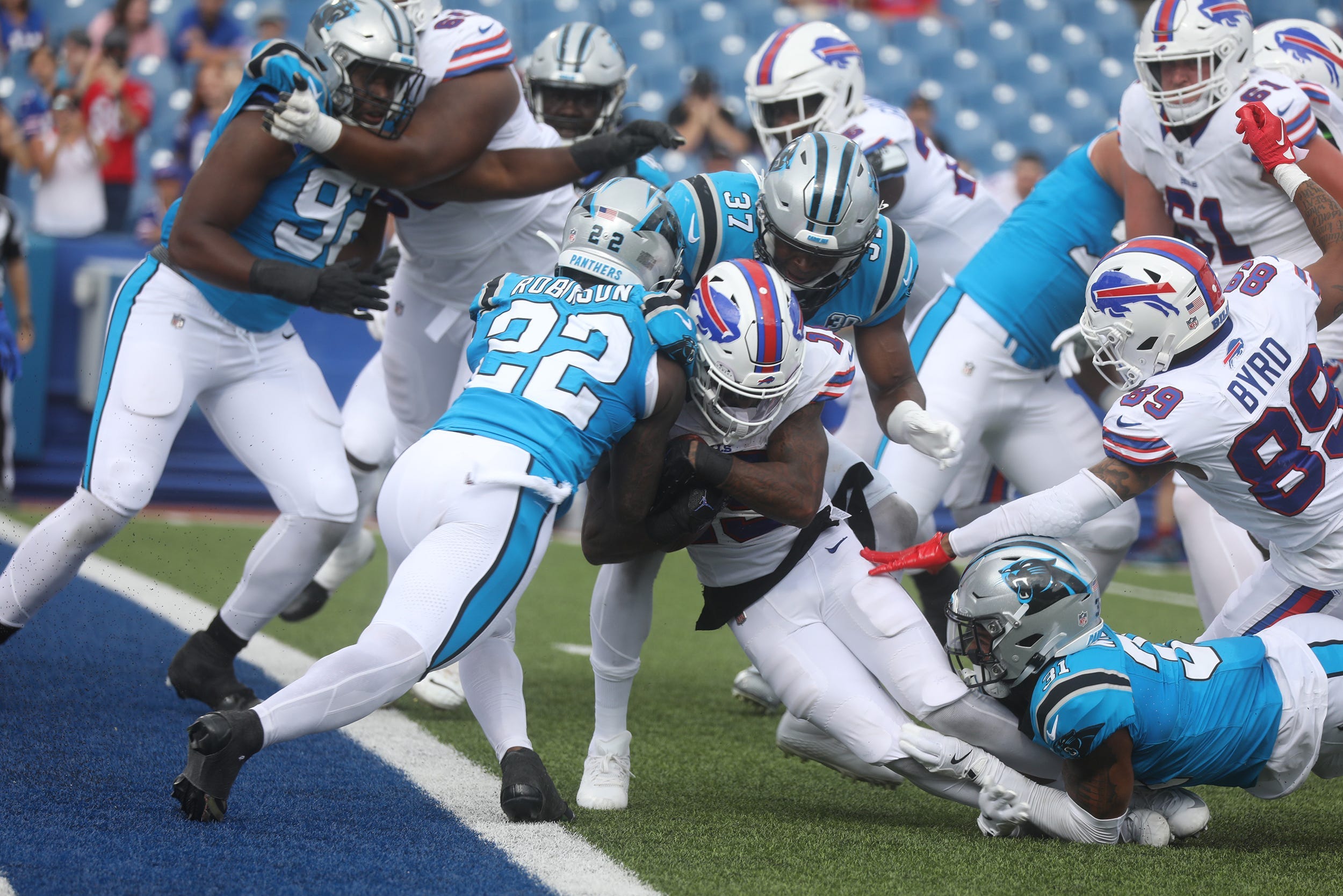 The Carolina Panthers' Jammie Robinson stops K.J. Hamler of the Buffalo Bills just short of the end zone during the second half of the preseason game at Highmark Stadium in Orchard Park on Aug. 24, 2024.