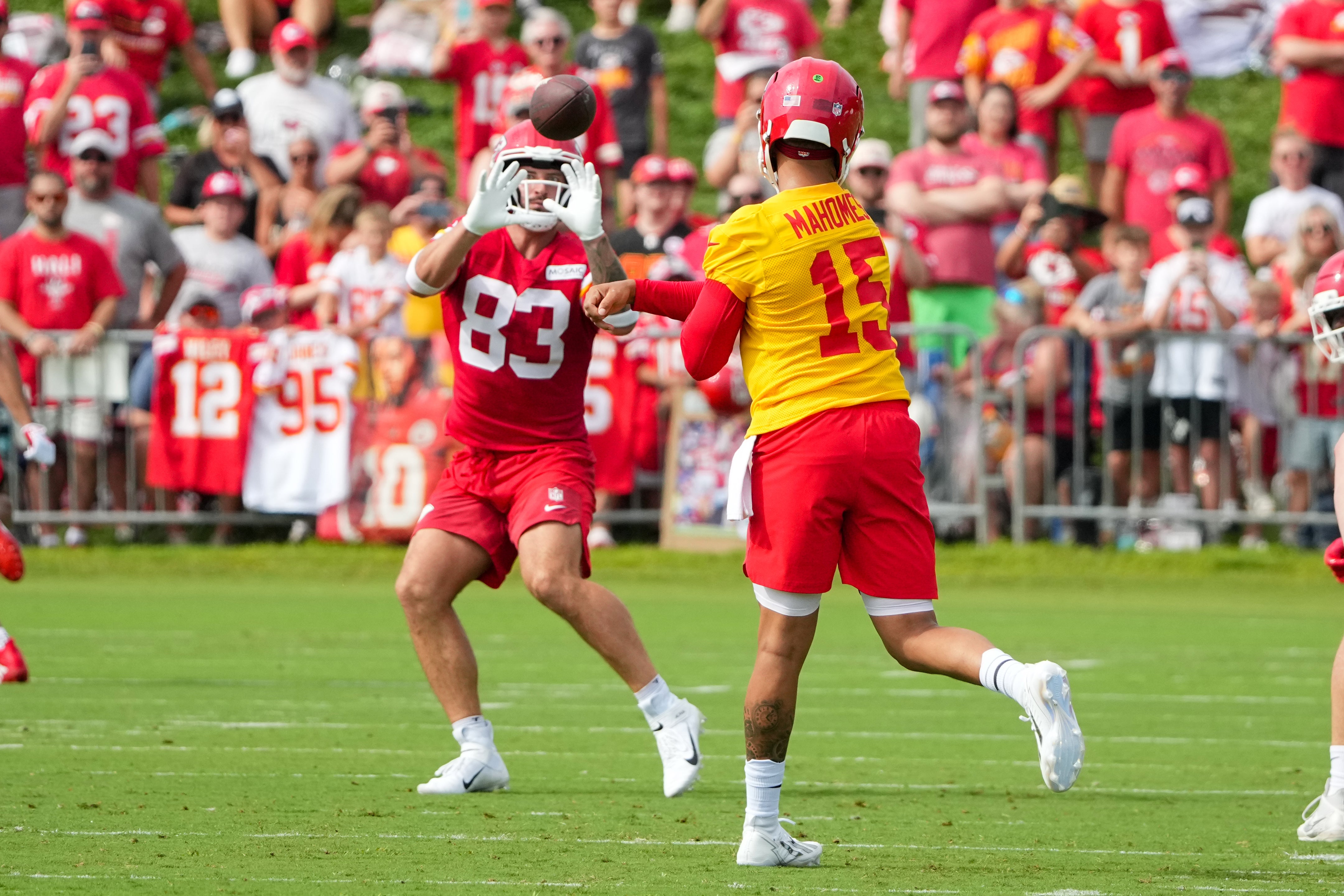 Kansas City Chiefs quarterback Patrick Mahomes (15) passes to tight end Noah Gray (83) during training camp at Missouri Western State University.