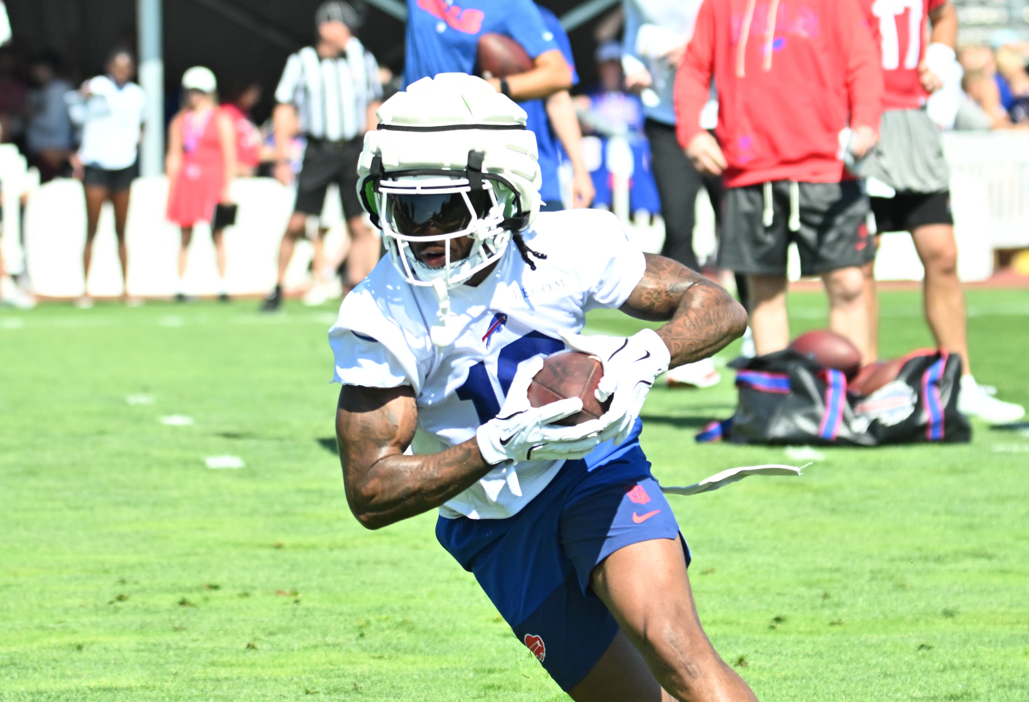 Jul 23, 2025; Rochester, NY, USA; Buffalo Bills wide receiver Elijah Moore (18) turns up field after catching a pass during training camp at St. John Fisher University.