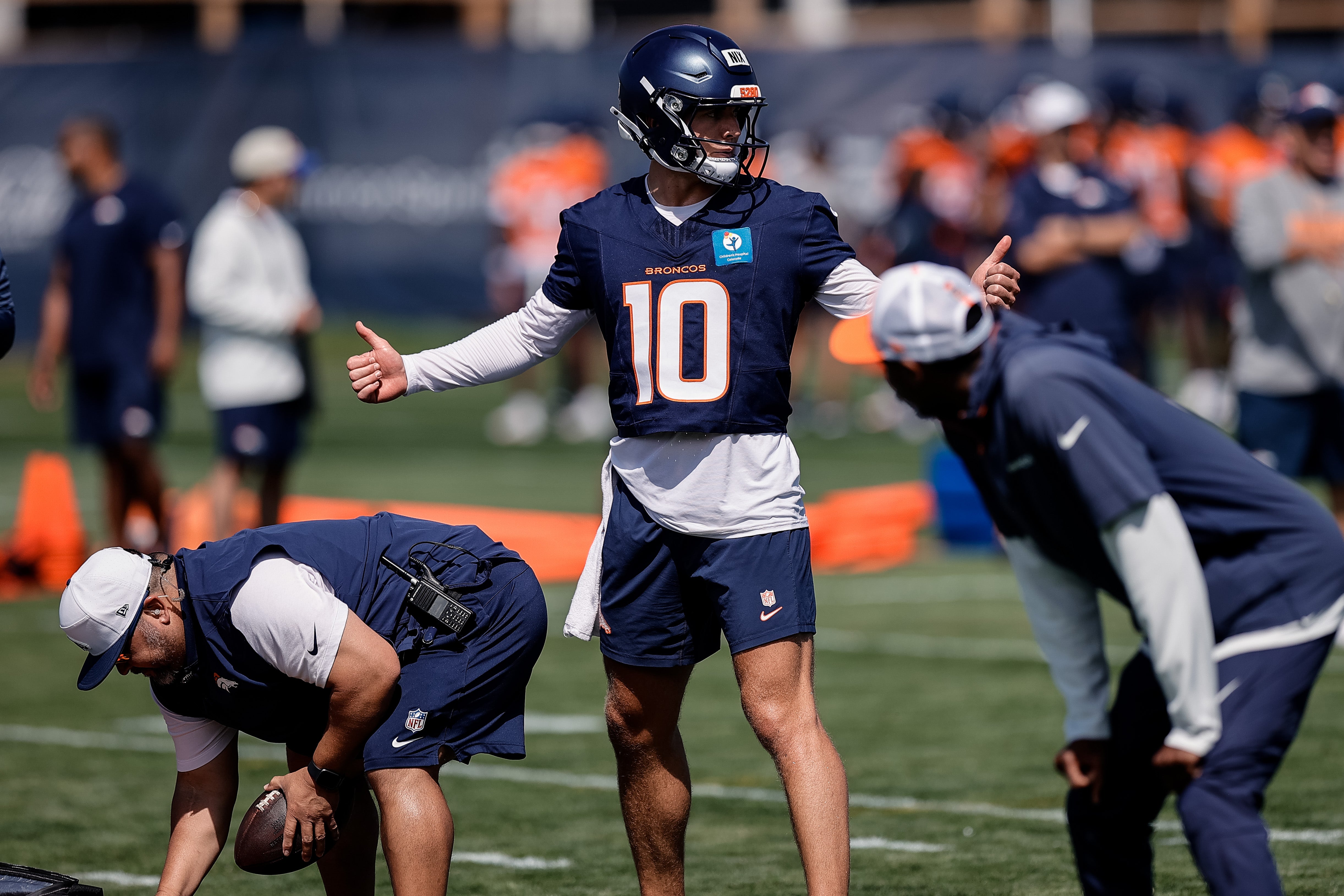 Denver Broncos QB Bo Nix takes some reps in training camp
