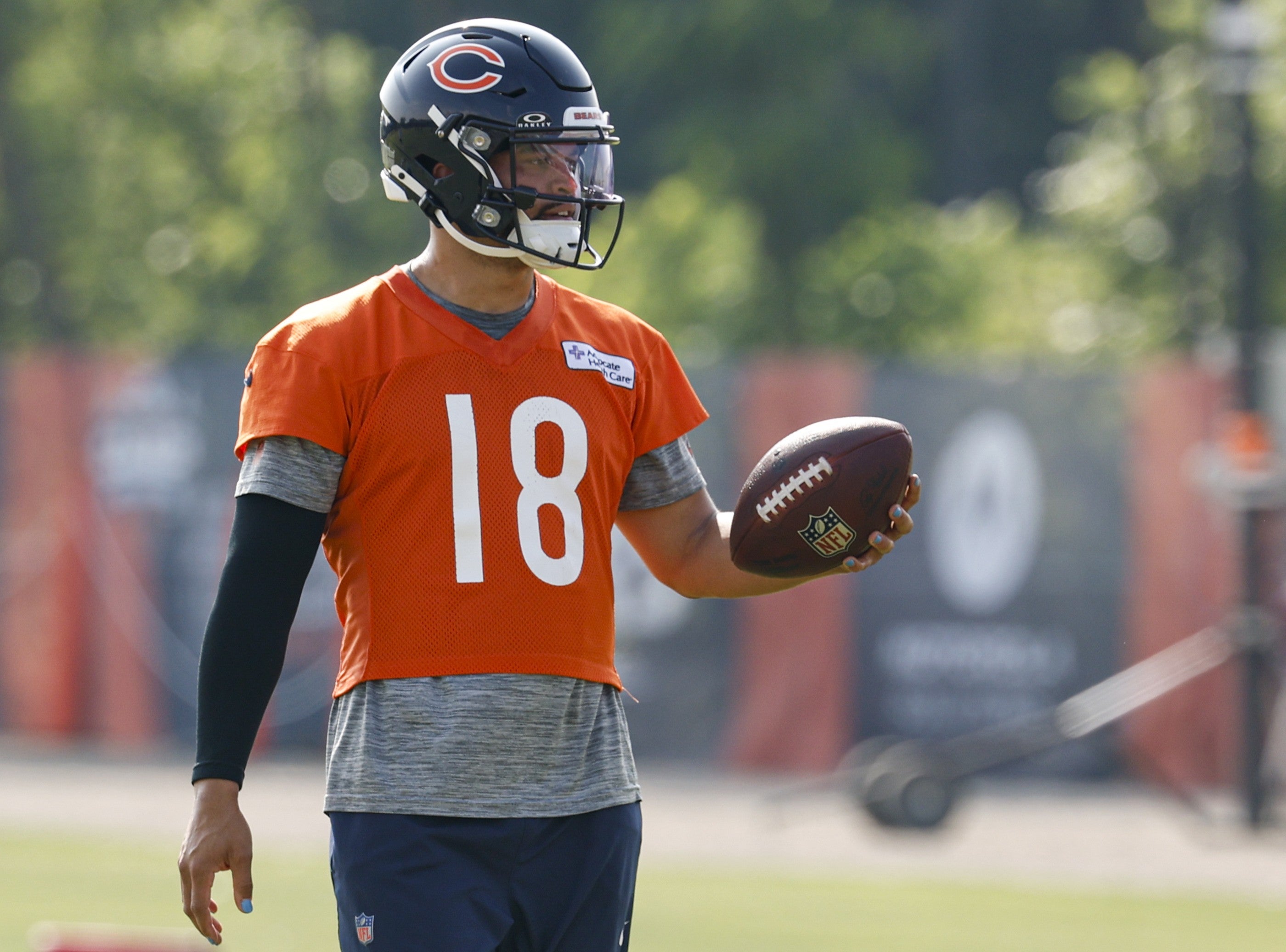 Jul 23, 2025; Lake Forest, IL, USA; Chicago Bears quarterback Caleb Williams (18) walks on the field during training camp at Halas Hall.