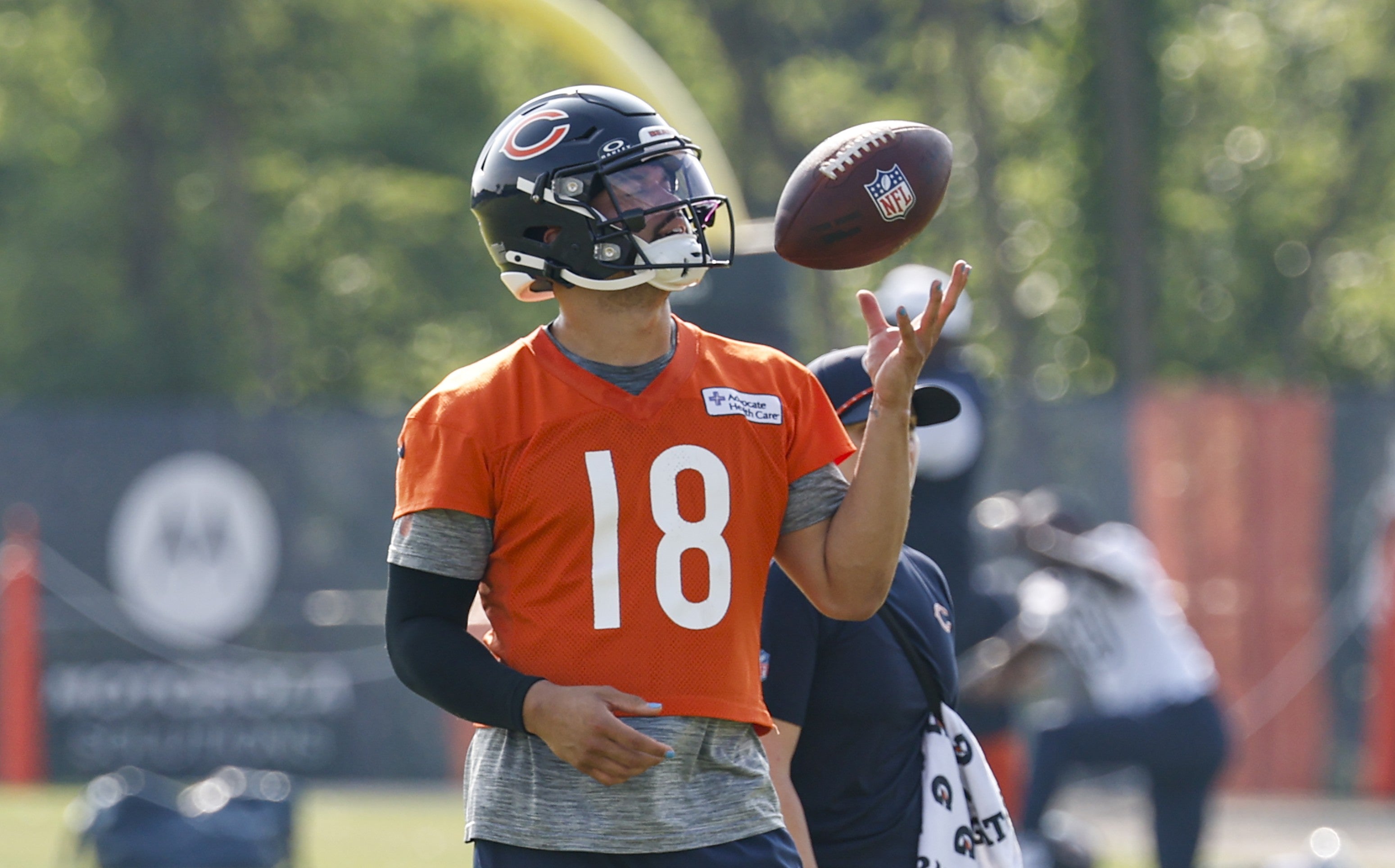 Jul 23, 2025; Lake Forest, IL, USA; Chicago Bears quarterback Caleb Williams (18) plays with the ball during training camp at Halas Hall.