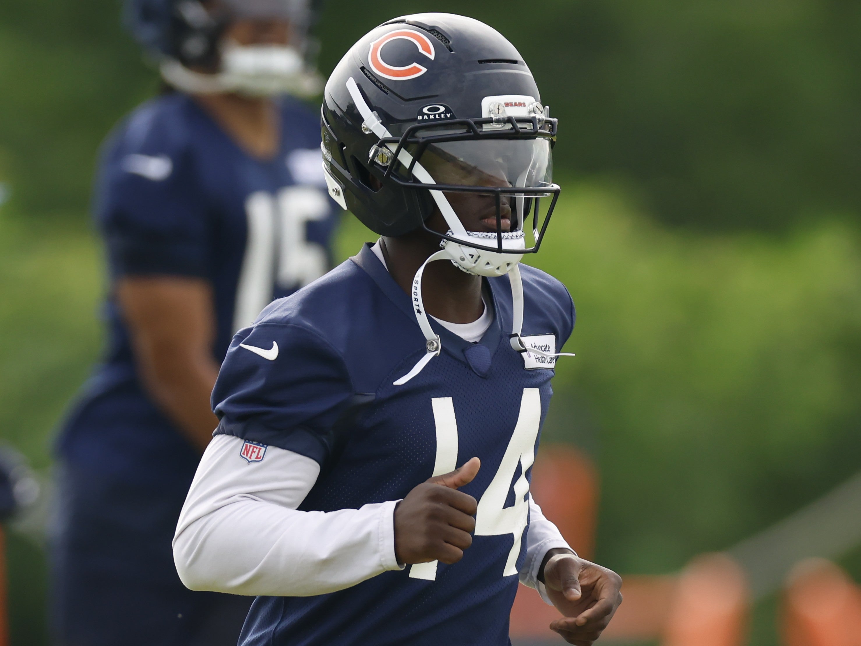Jul 24, 2025; Lake Forest, IL, USA; Chicago Bears wide receiver Olamide Zaccheaus (14) runs on the field during training camp at Halas Hall.