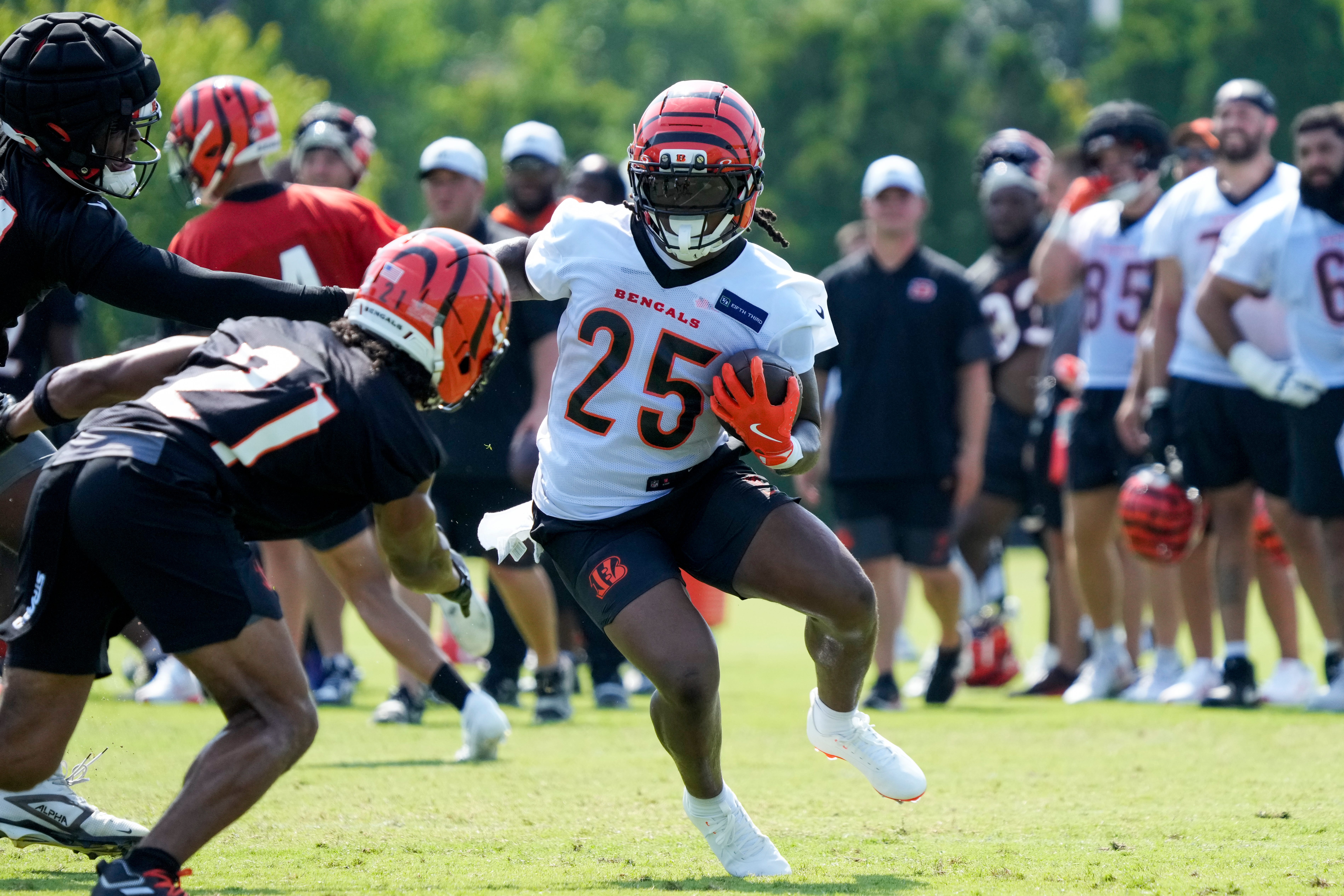 Cincinnati Bengals running back Tahj Brooks (25) runs the ball during the second day of preseason training camp in downtown Cincinnati on Thursday, July 24, 2025.