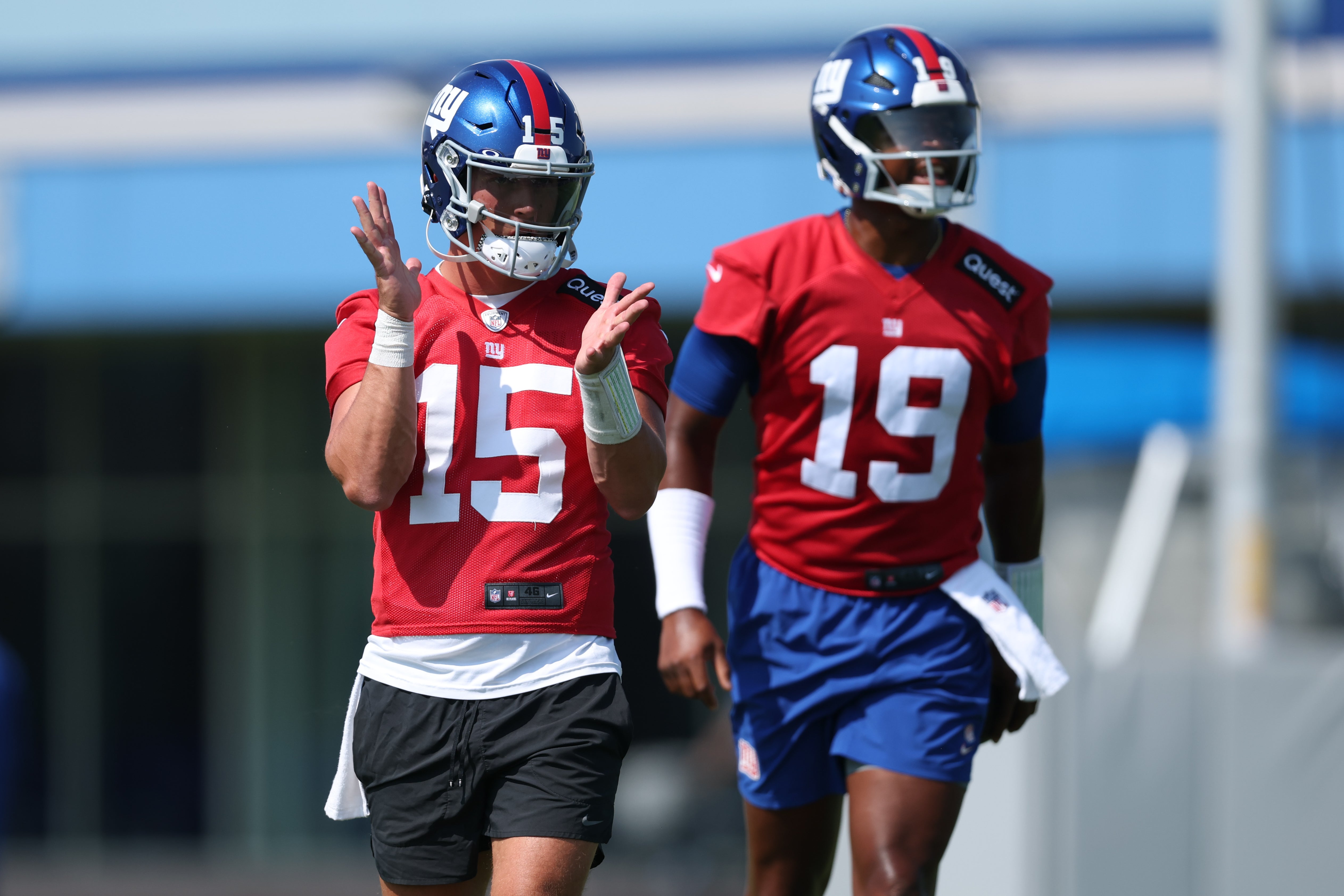 Jul 24, 2025; East Rutherford, NJ, USA; New York Giants quarterback Tommy DeVito (15) and New York Giants quarterback Jameis Winston (19) during training camp at Quest Diagnostics Training Center.