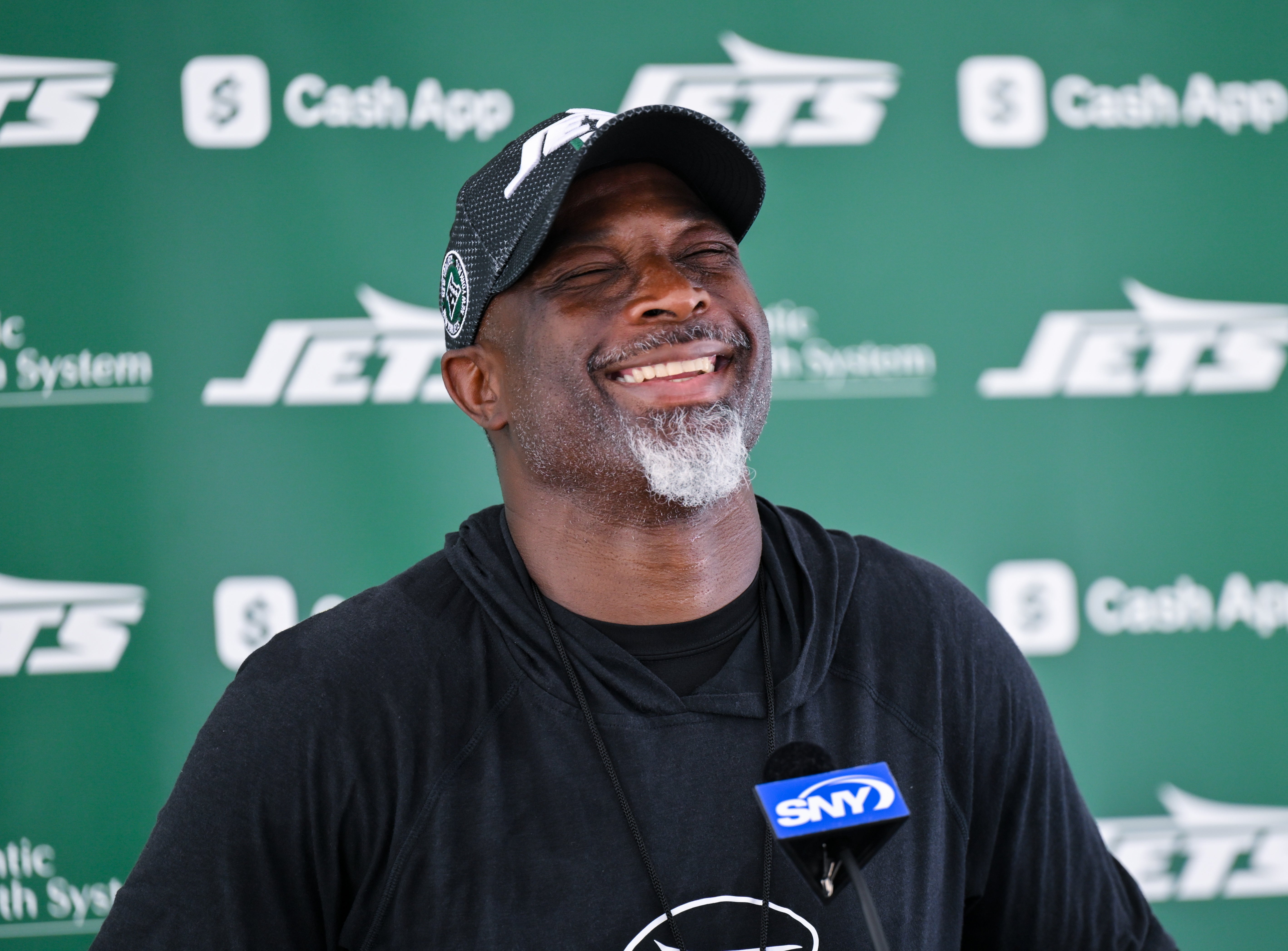 Jul 25, 2025; Florham Park, NJ, USA; New York Jets head coach Aaron Glenn speaks to the media during training camp at Atlantic Health Jets Training Center.
