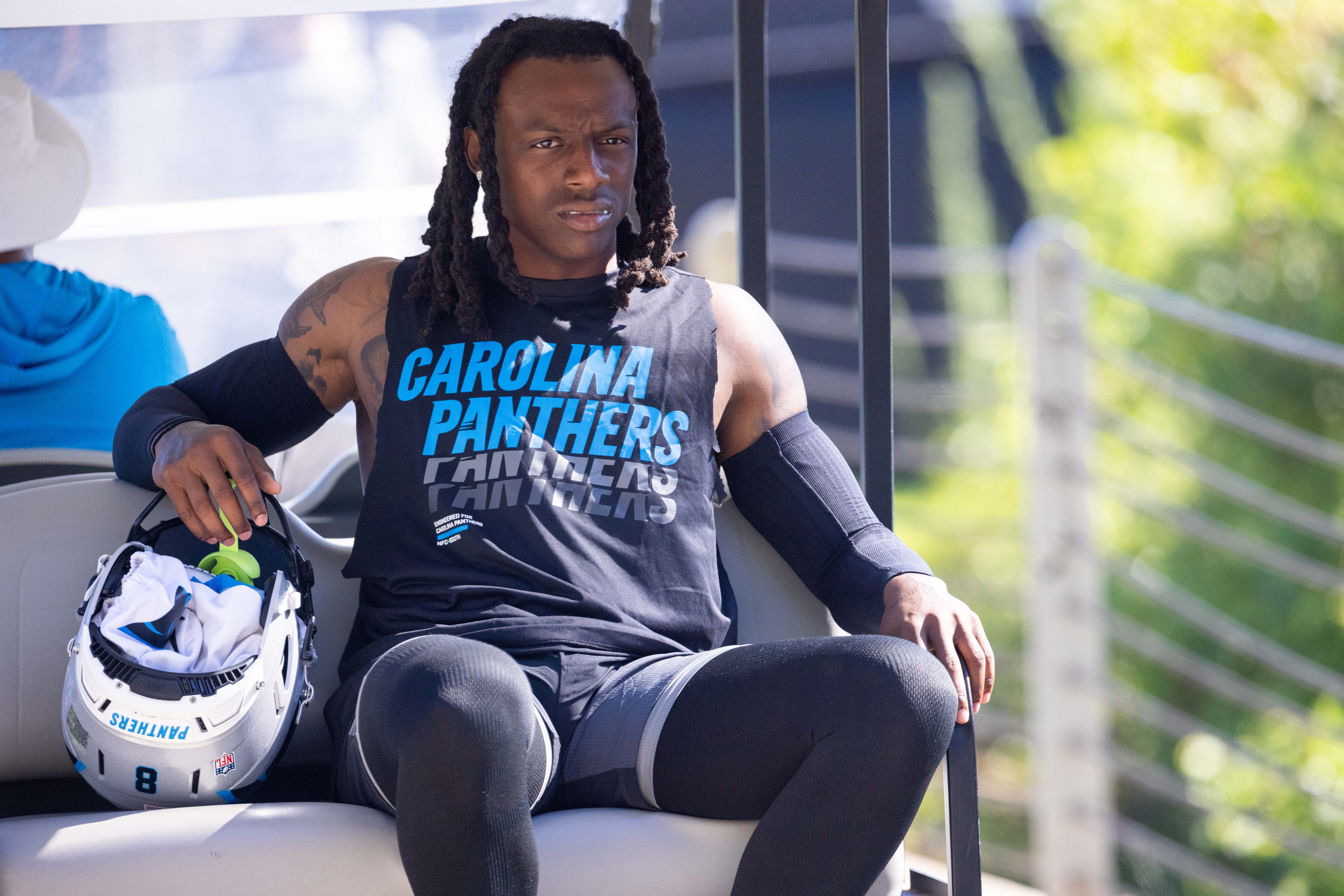 Jul 26, 2025; Charlotte, NC, USA; Carolina Panthers cornerback Jaycee Horn (8) rides to practice during training camp.