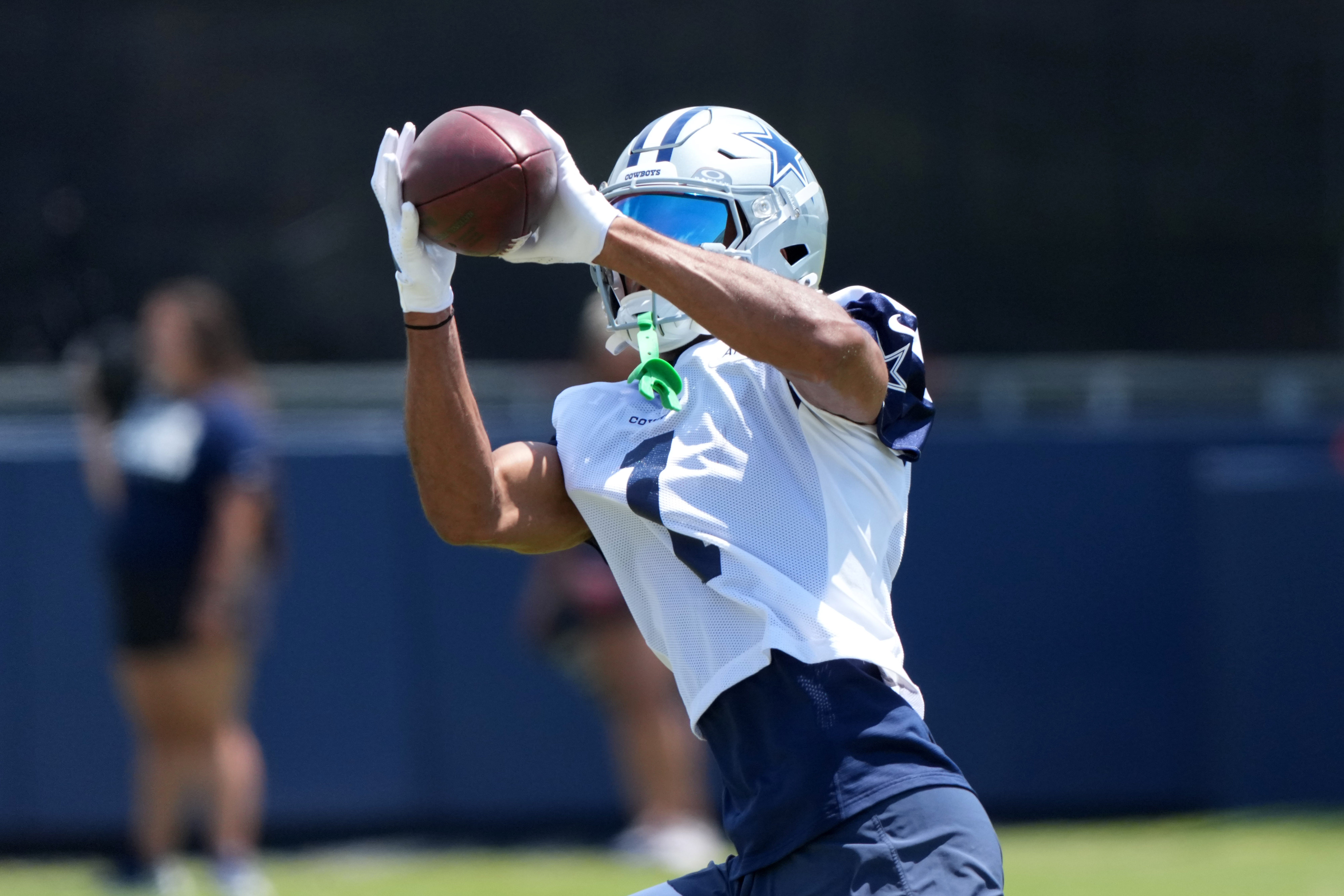 Dallas Cowboys receiver Jalen Tolbert (1) catches the ball at training camp at the River Ridge Fields.