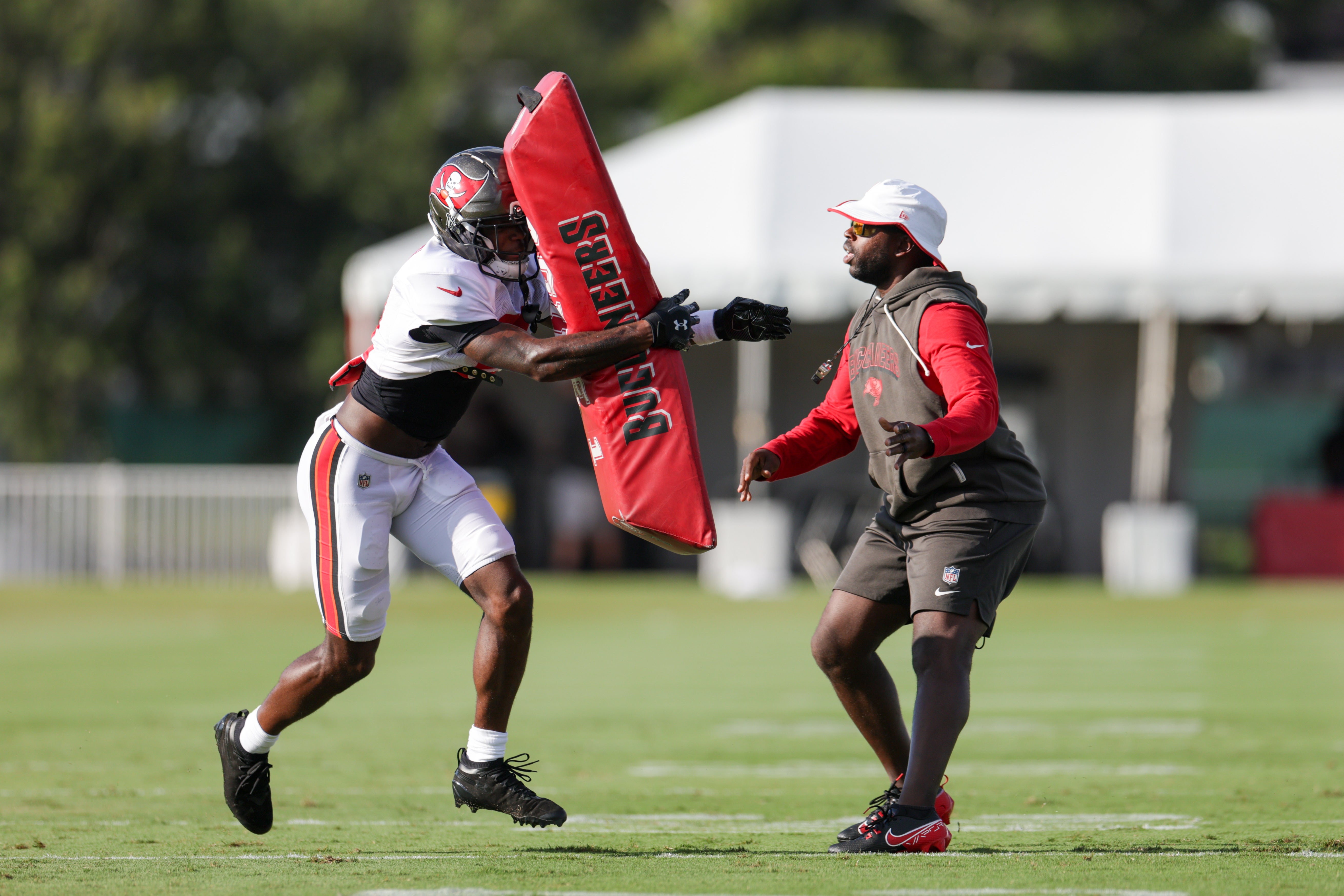 Jul 31, 2025; Tampa, FL, USA; Tampa Bay Buccaneers cornerback Benjamin Morrison (21) participates in training camp at AdventHealth Training Center.