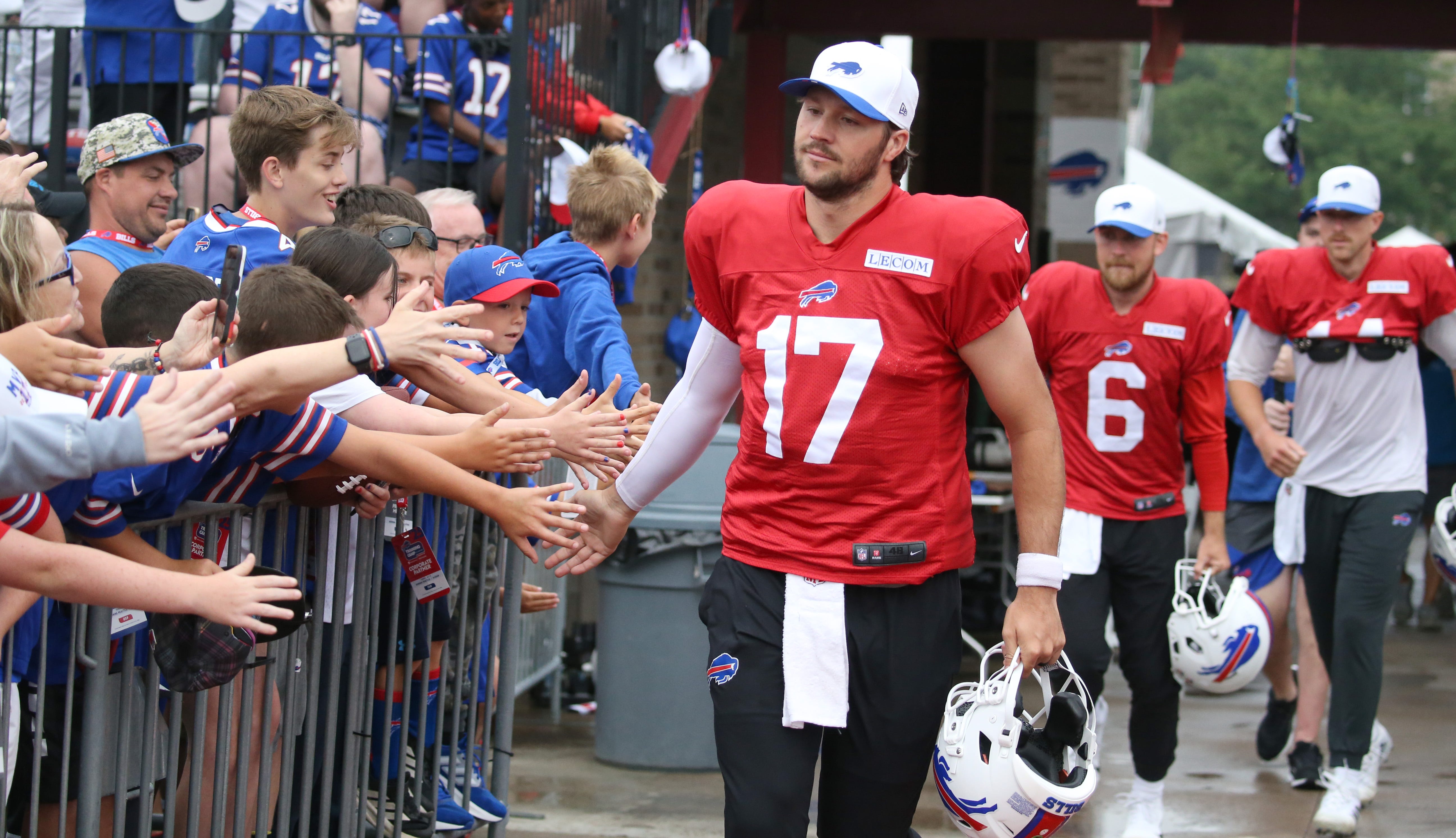 Buffalo Bills QB greets fans while getting ready to participate in training camp at St John Fisher University
